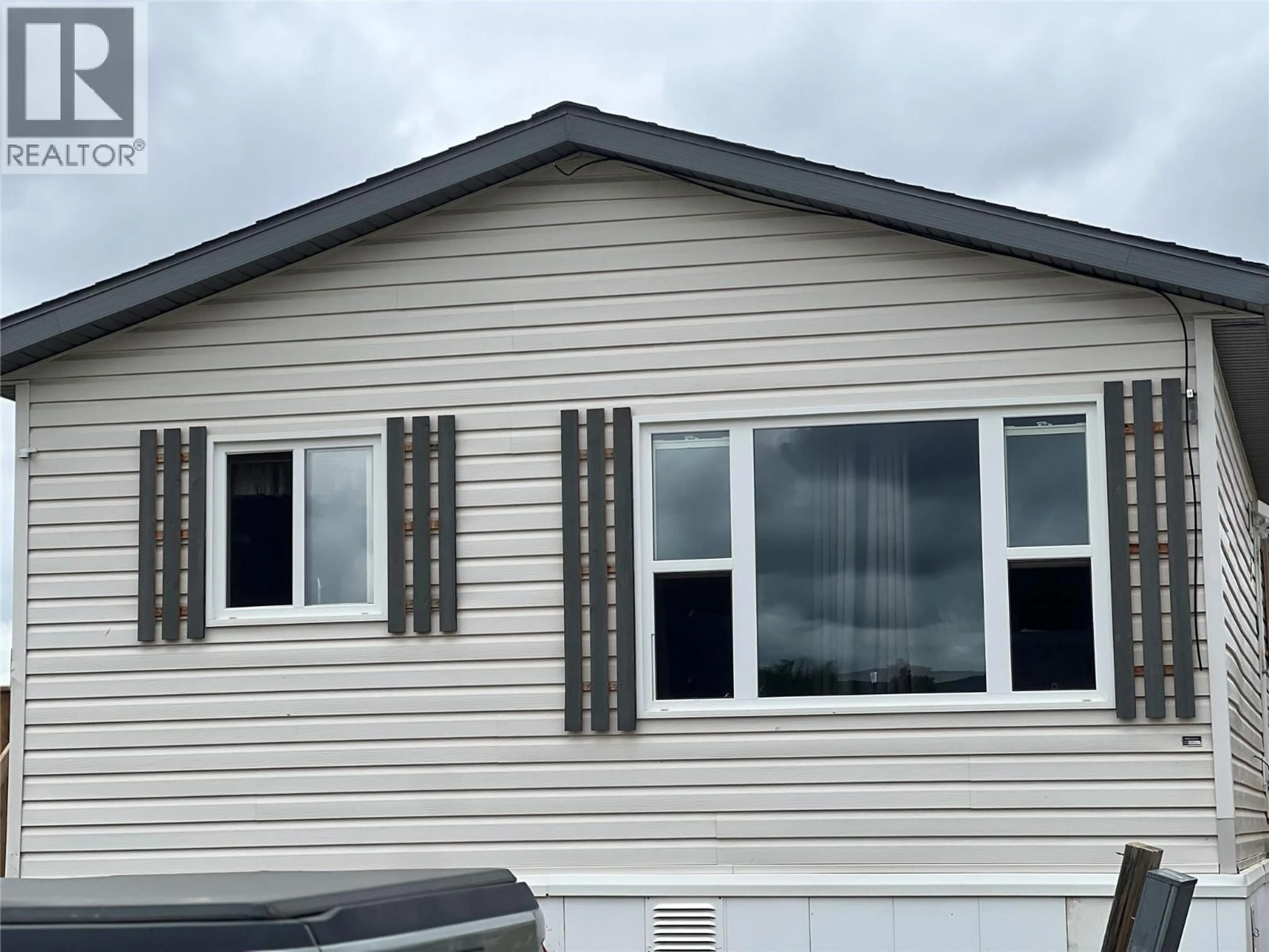 Home with vinyl exterior material, building for 9 - 9800 18 STREET, Dawson Creek British Columbia V1G5A4