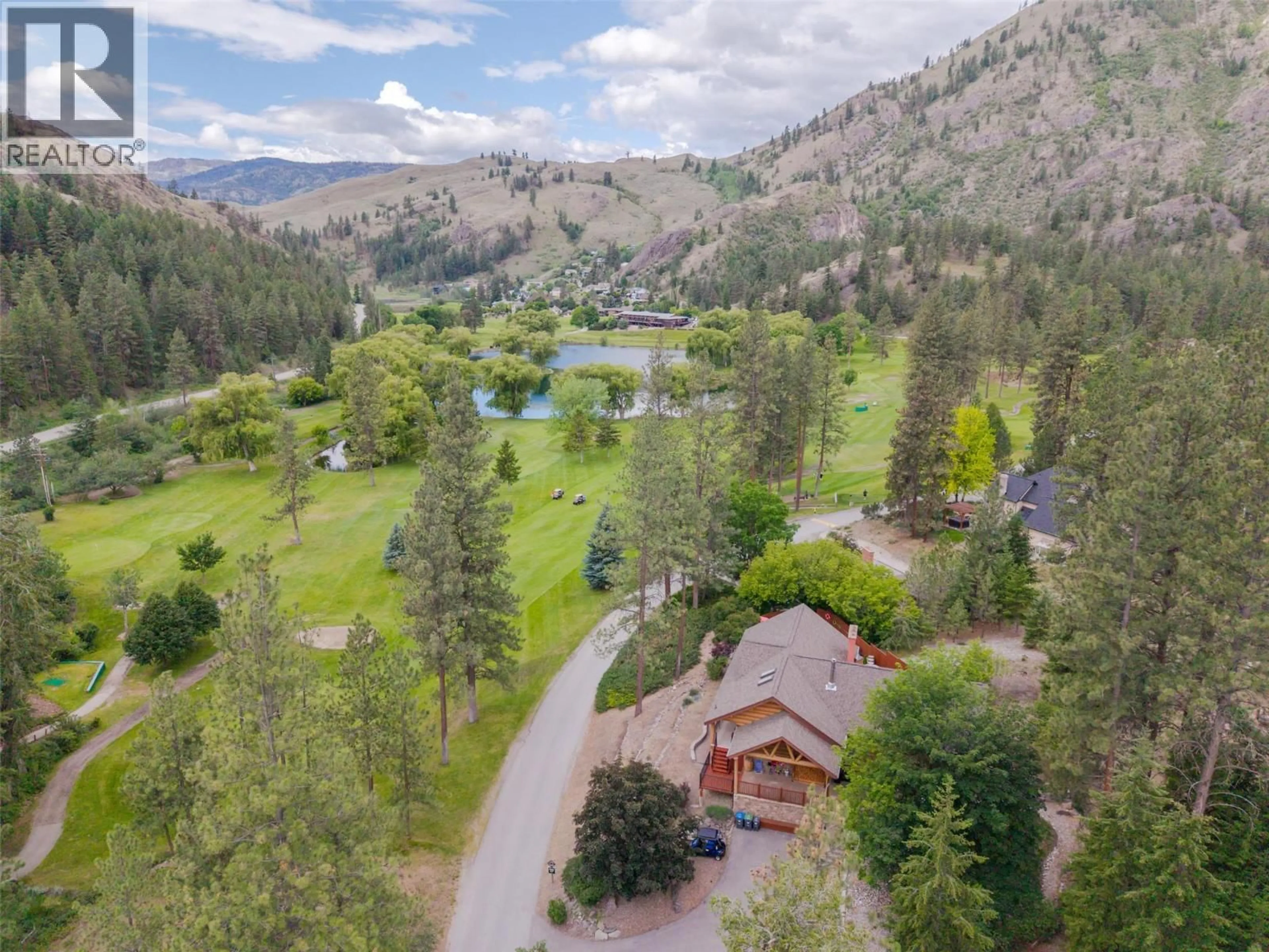 A pic from outside/outdoor area/front of a property/back of a property/a pic from drone, mountain view for 100 ST. ANDREWS DRIVE, Kaleden British Columbia V0H1K0