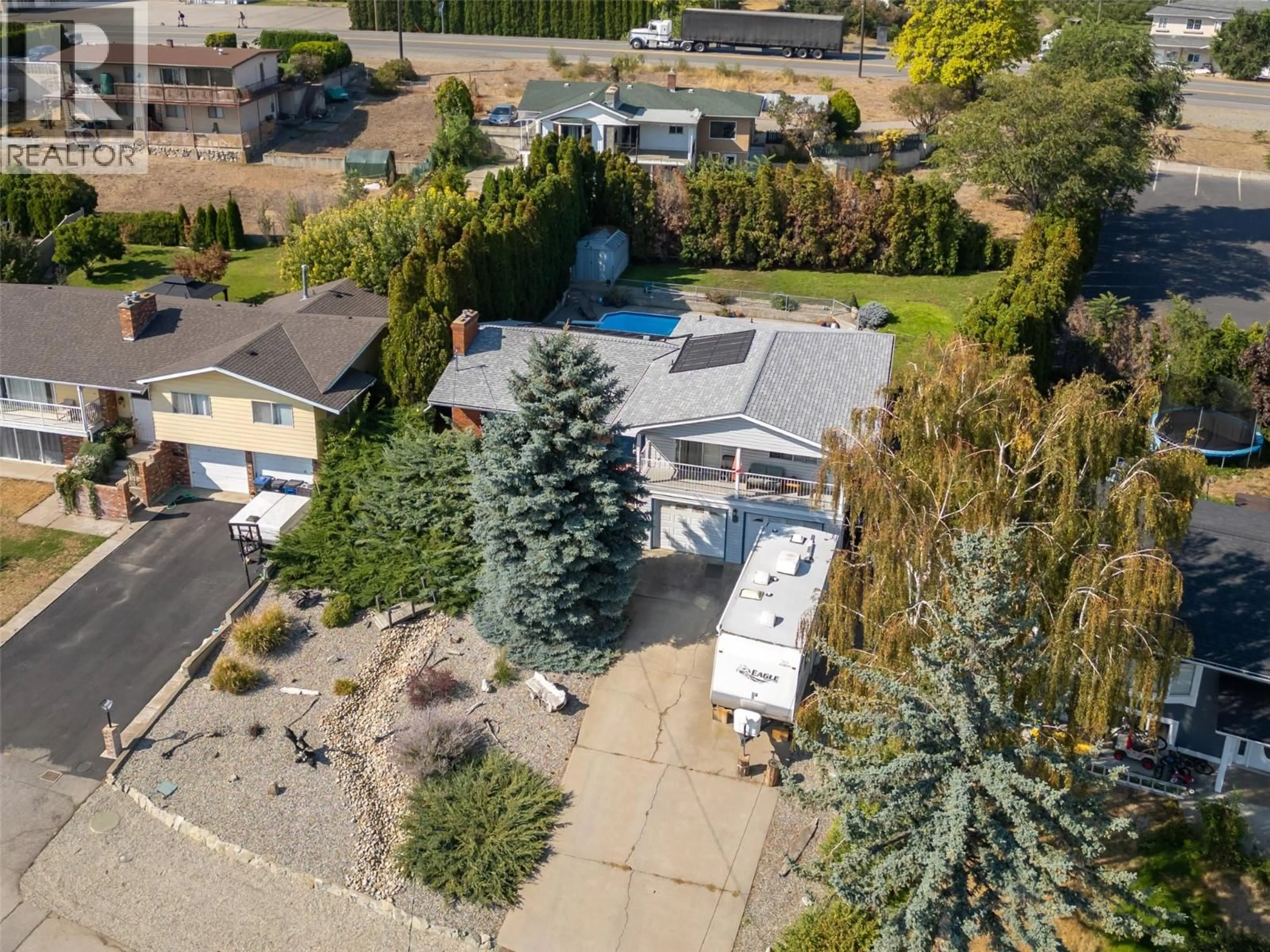 A pic from outside/outdoor area/front of a property/back of a property/a pic from drone, street for 10 QUAIL PLACE, Osoyoos British Columbia V0H1V1