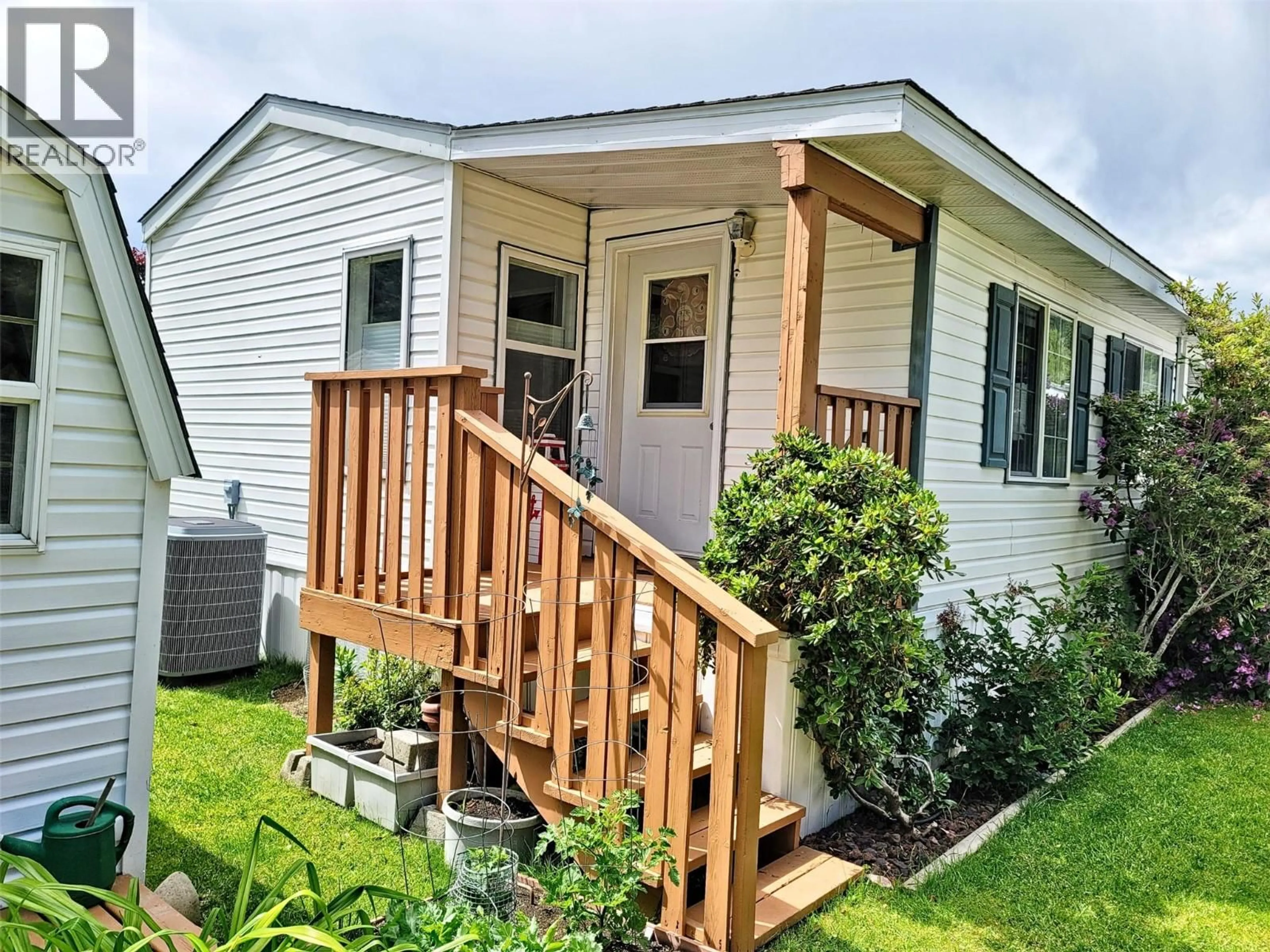 Home with vinyl exterior material, street for 9 - 651 ROSEDALE ROAD, Castlegar British Columbia V1N4L2