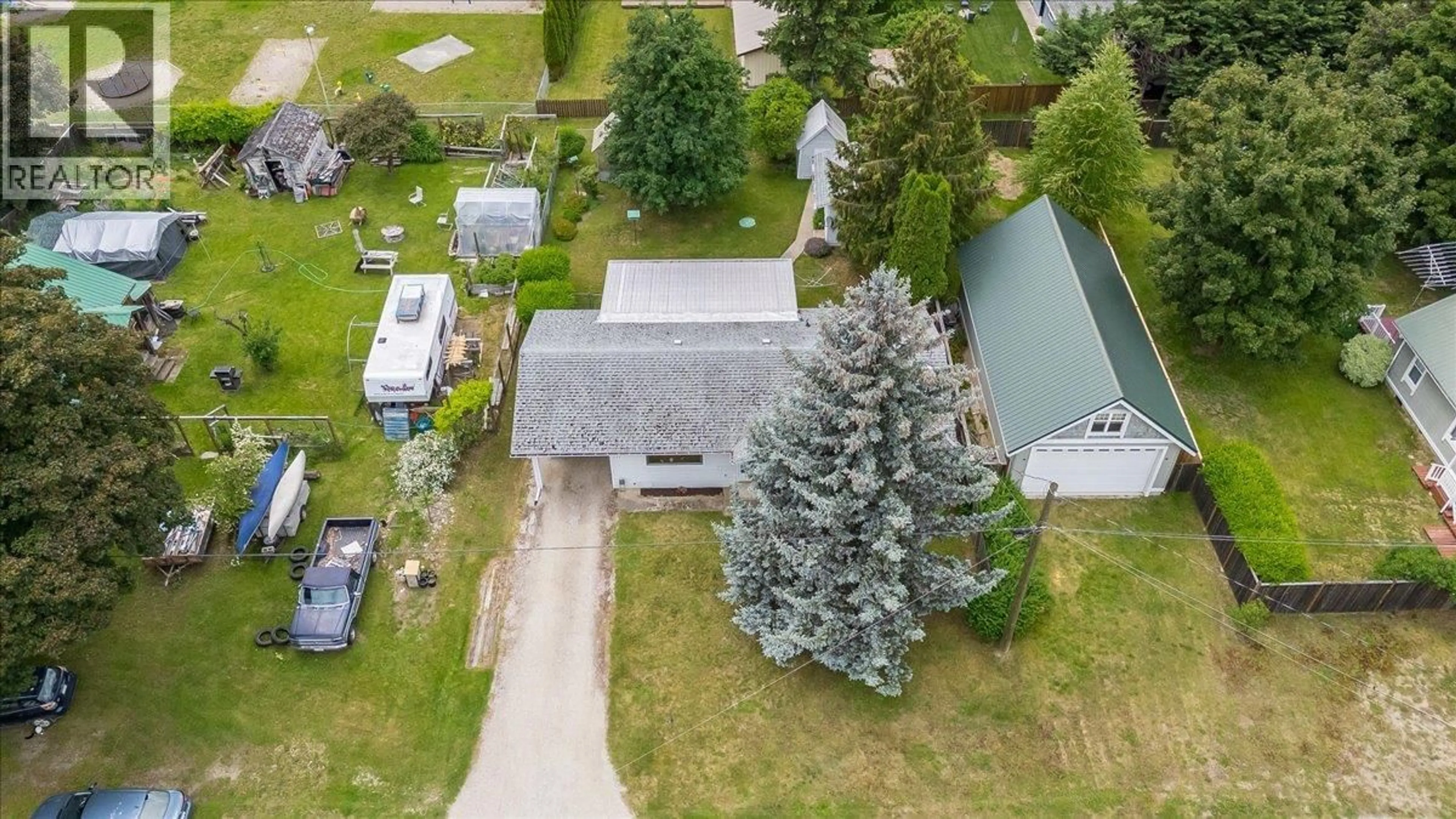 A pic from outside/outdoor area/front of a property/back of a property/a pic from drone, street for 507 ARTHUR STREET, Slocan British Columbia V0G2C0