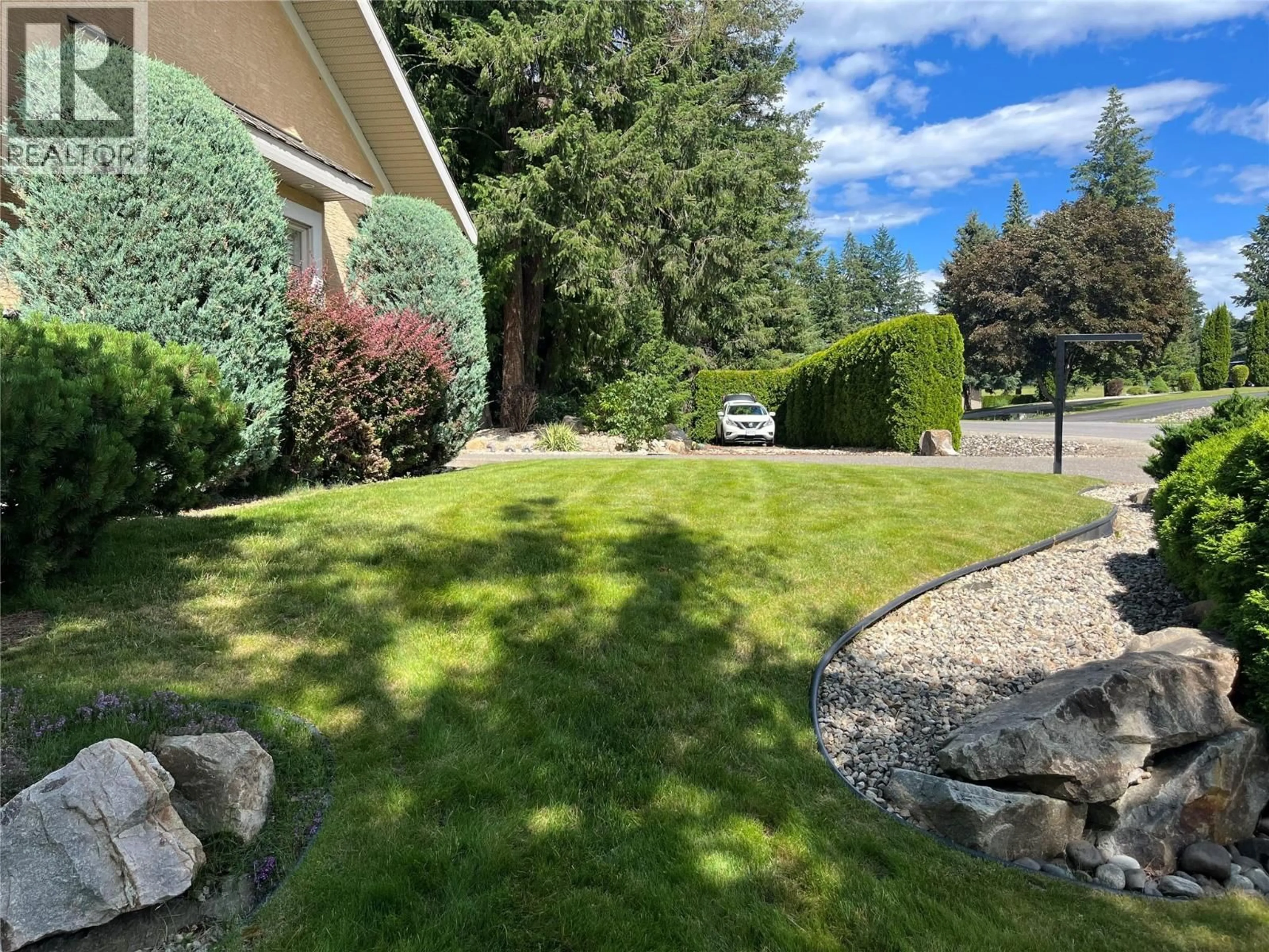 A pic from outside/outdoor area/front of a property/back of a property/a pic from drone, mountain view for 2491 GOLF COURSE DRIVE, Blind Bay British Columbia V0E1H2
