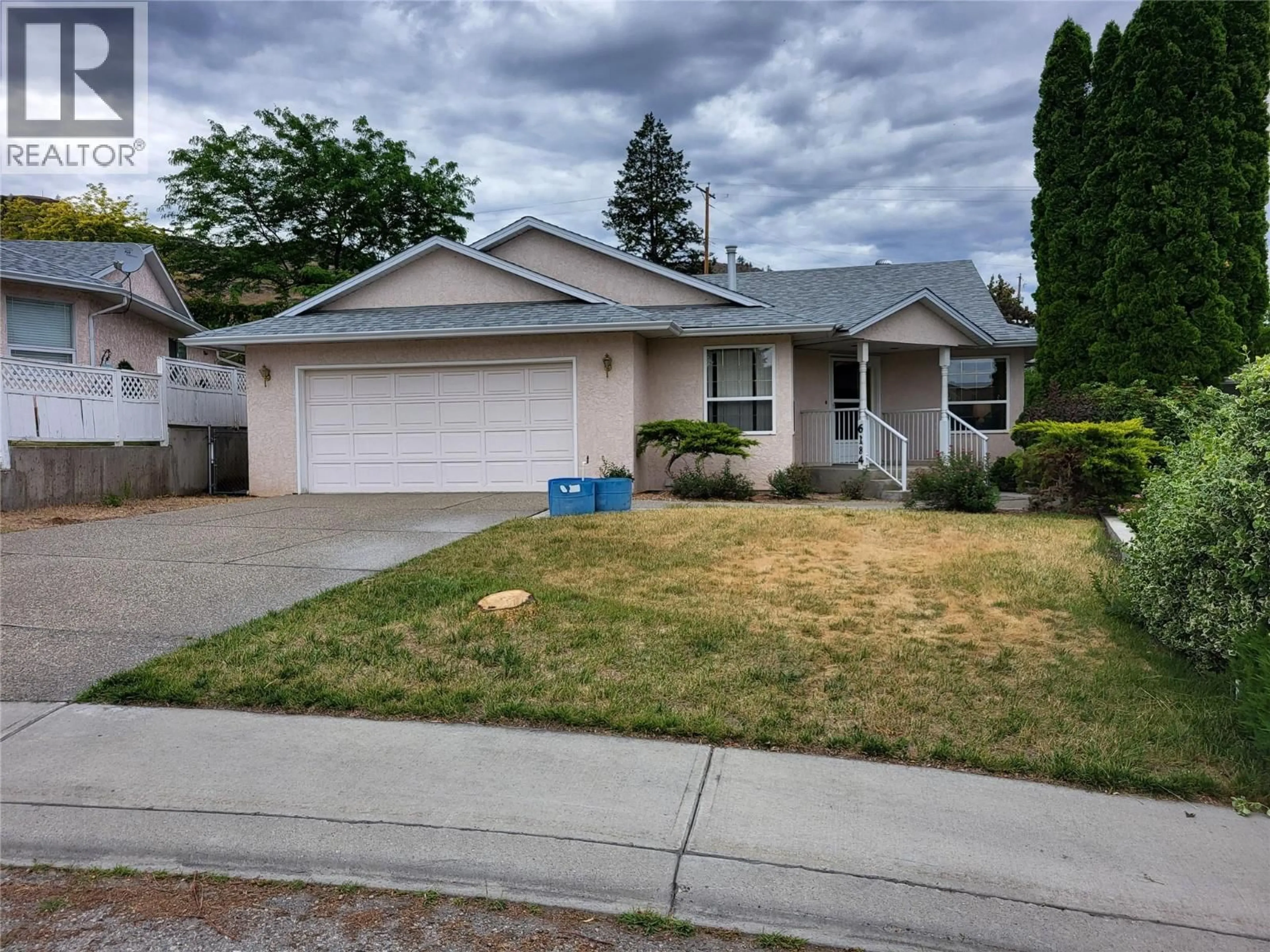 Home with vinyl exterior material, street for 6184 SAINT MARTIN PLACE, Oliver British Columbia V0H1T0