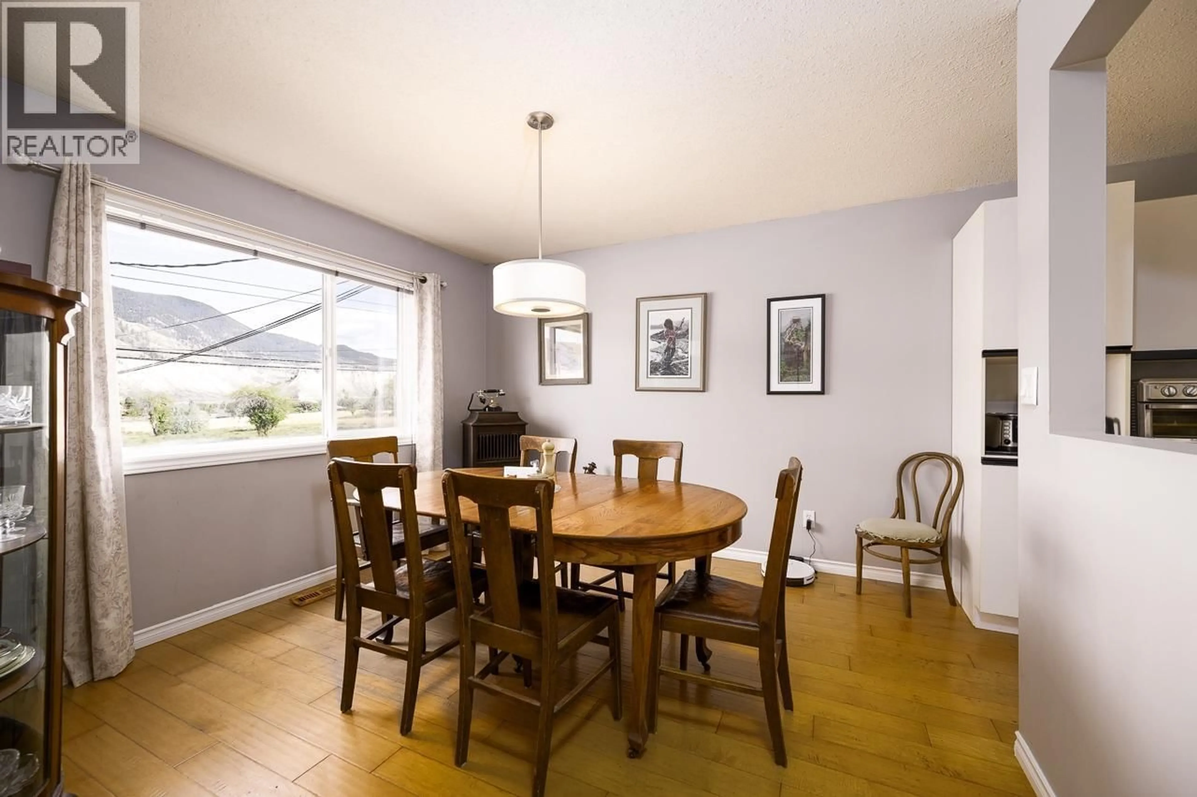 Dining room, wood/laminate floor for 6037 DALLAS DRIVE, Kamloops British Columbia V2C5Z9