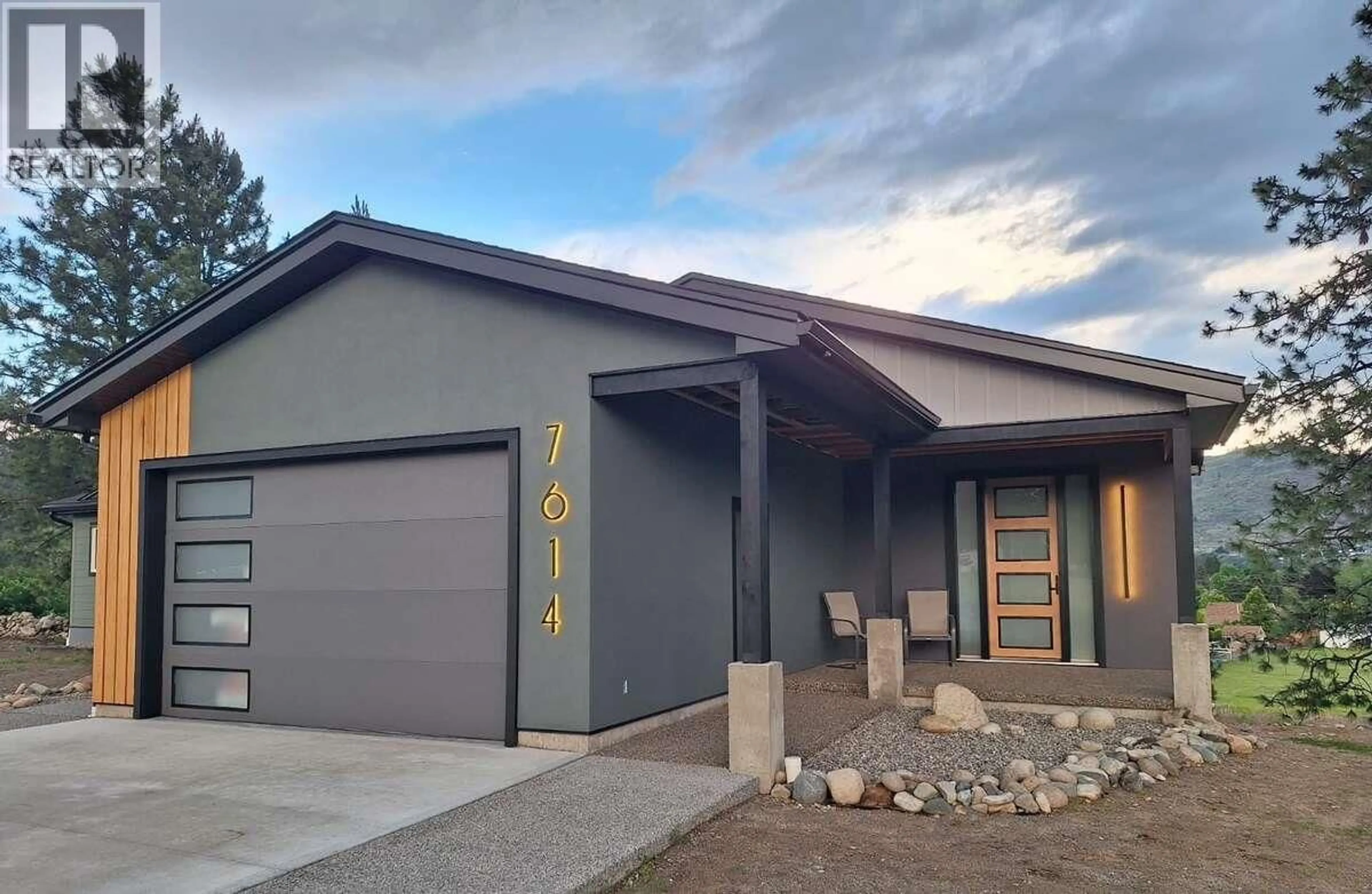 Home with vinyl exterior material, street for 7614 MCCALLUM VIEW DRIVE, Grand Forks British Columbia V0H1H2