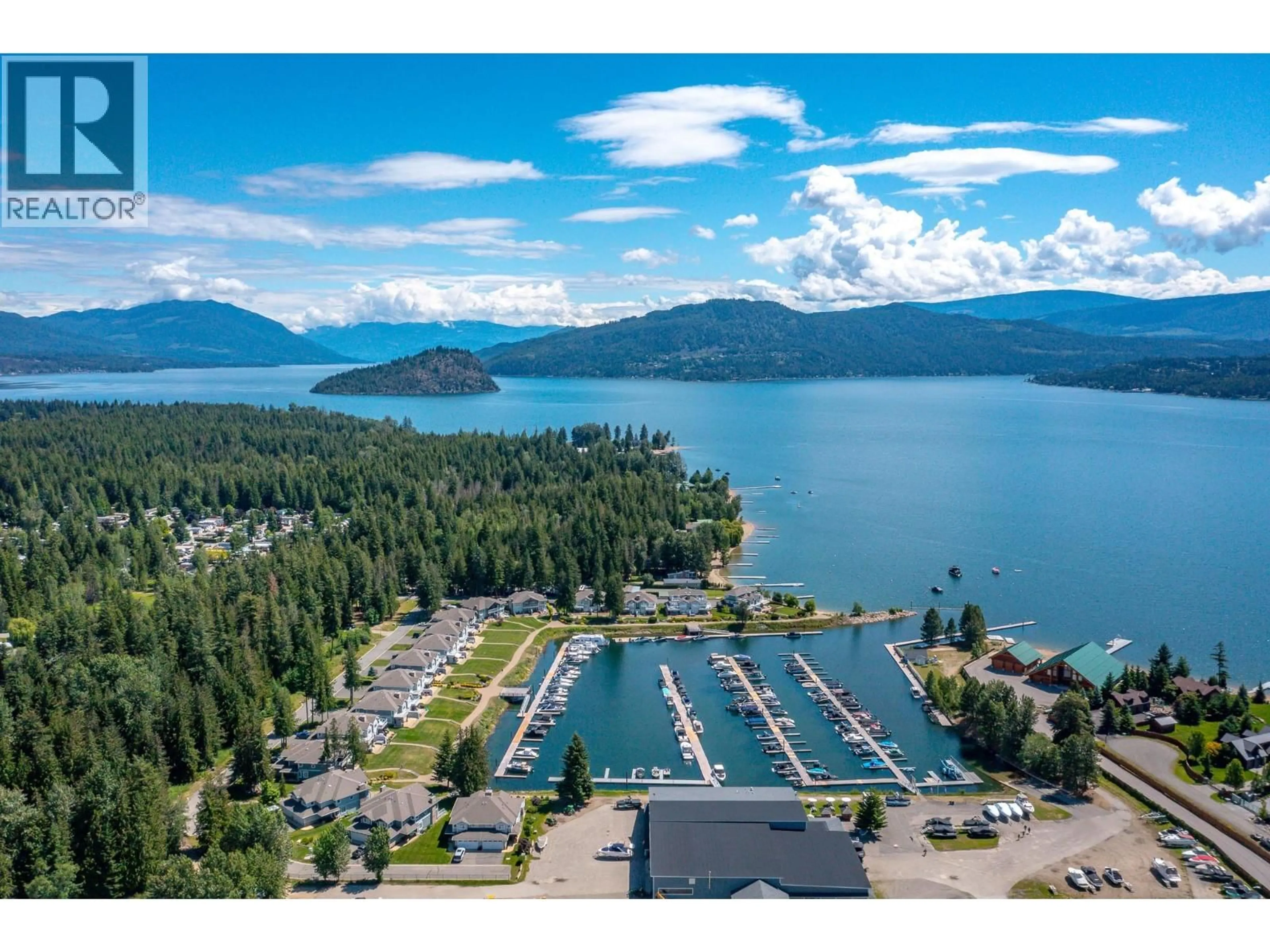 A pic from outside/outdoor area/front of a property/back of a property/a pic from drone, water/lake/river/ocean view for 13 - 3950 EXPRESS POINT ROAD, Scotch Creek British Columbia V0E1M5
