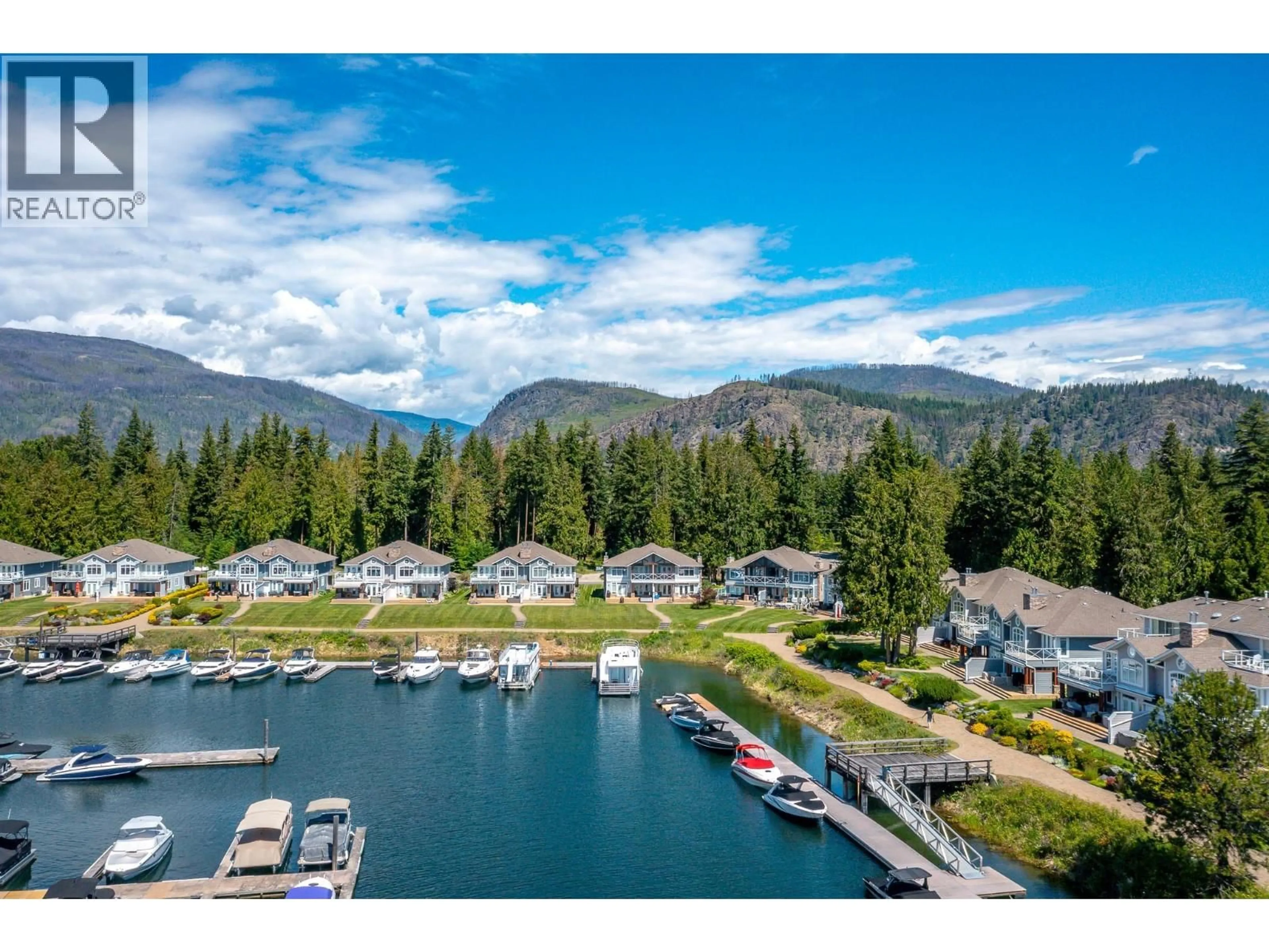 A pic from outside/outdoor area/front of a property/back of a property/a pic from drone, water/lake/river/ocean view for 13 - 3950 EXPRESS POINT ROAD, Scotch Creek British Columbia V0E1M5