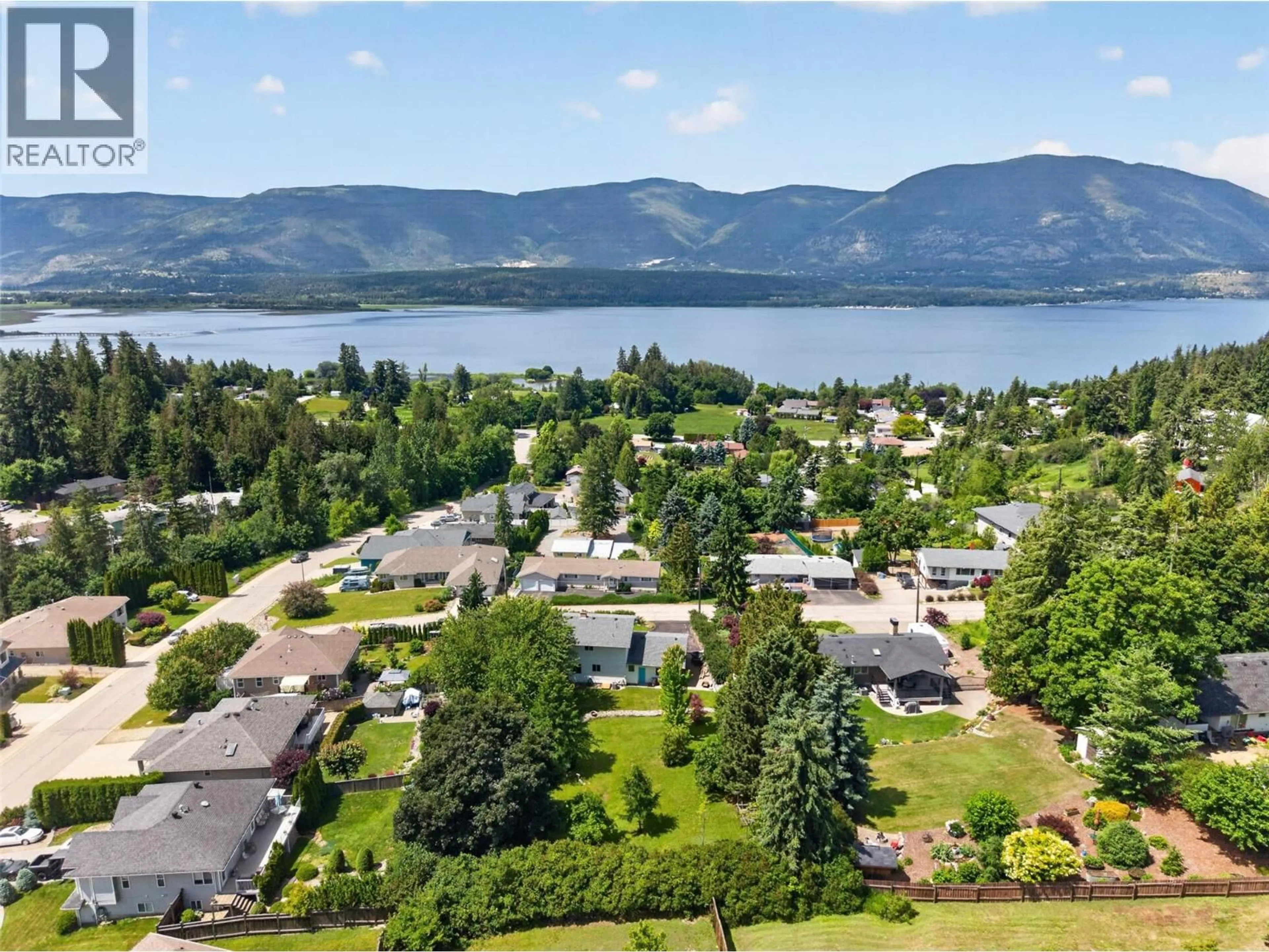 A pic from outside/outdoor area/front of a property/back of a property/a pic from drone, water/lake/river/ocean view for 2460 23 STREET NORTHEAST, Salmon Arm British Columbia V1E3Y4
