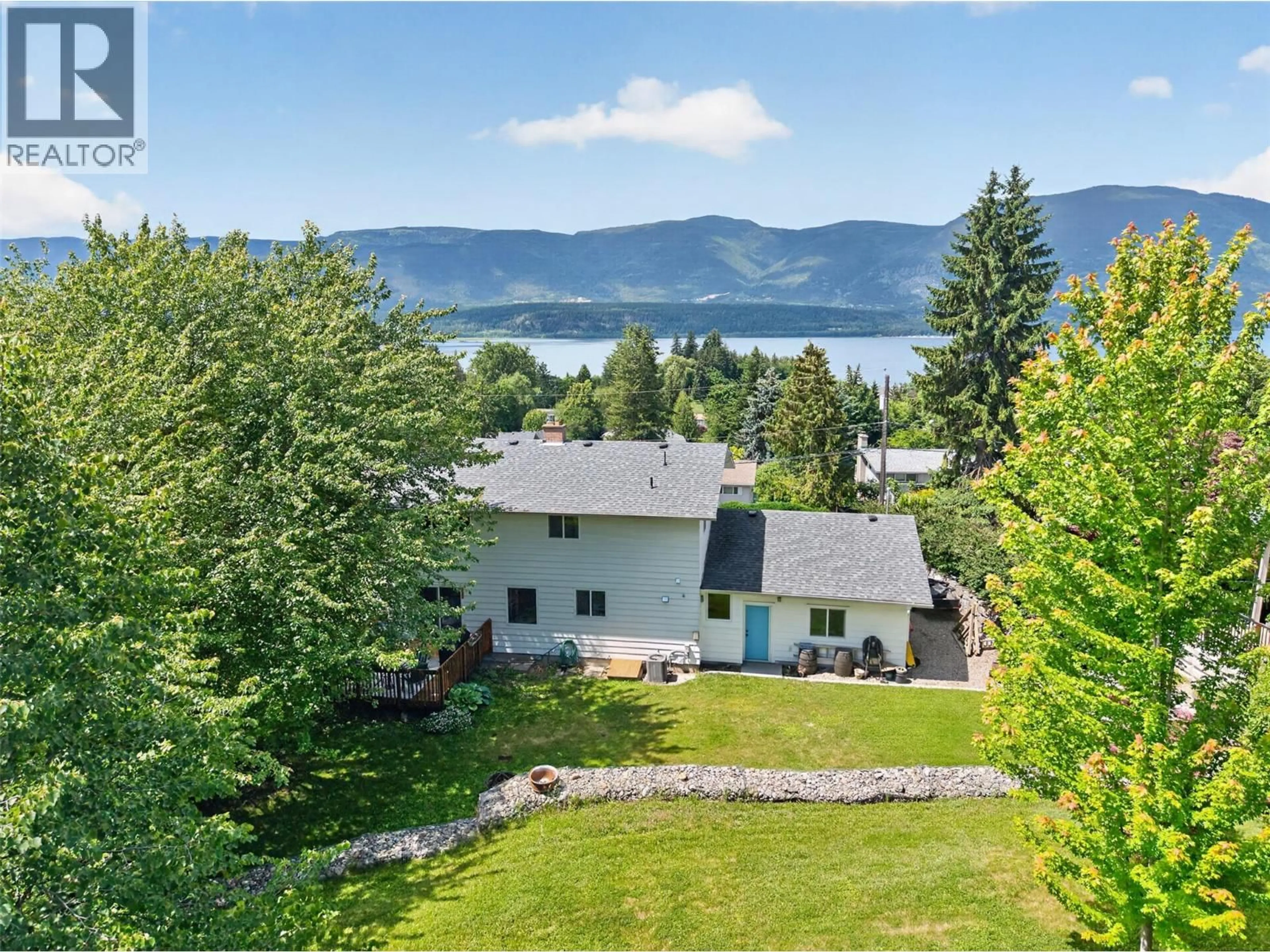 A pic from outside/outdoor area/front of a property/back of a property/a pic from drone, water/lake/river/ocean view for 2460 23 STREET NORTHEAST, Salmon Arm British Columbia V1E3Y4