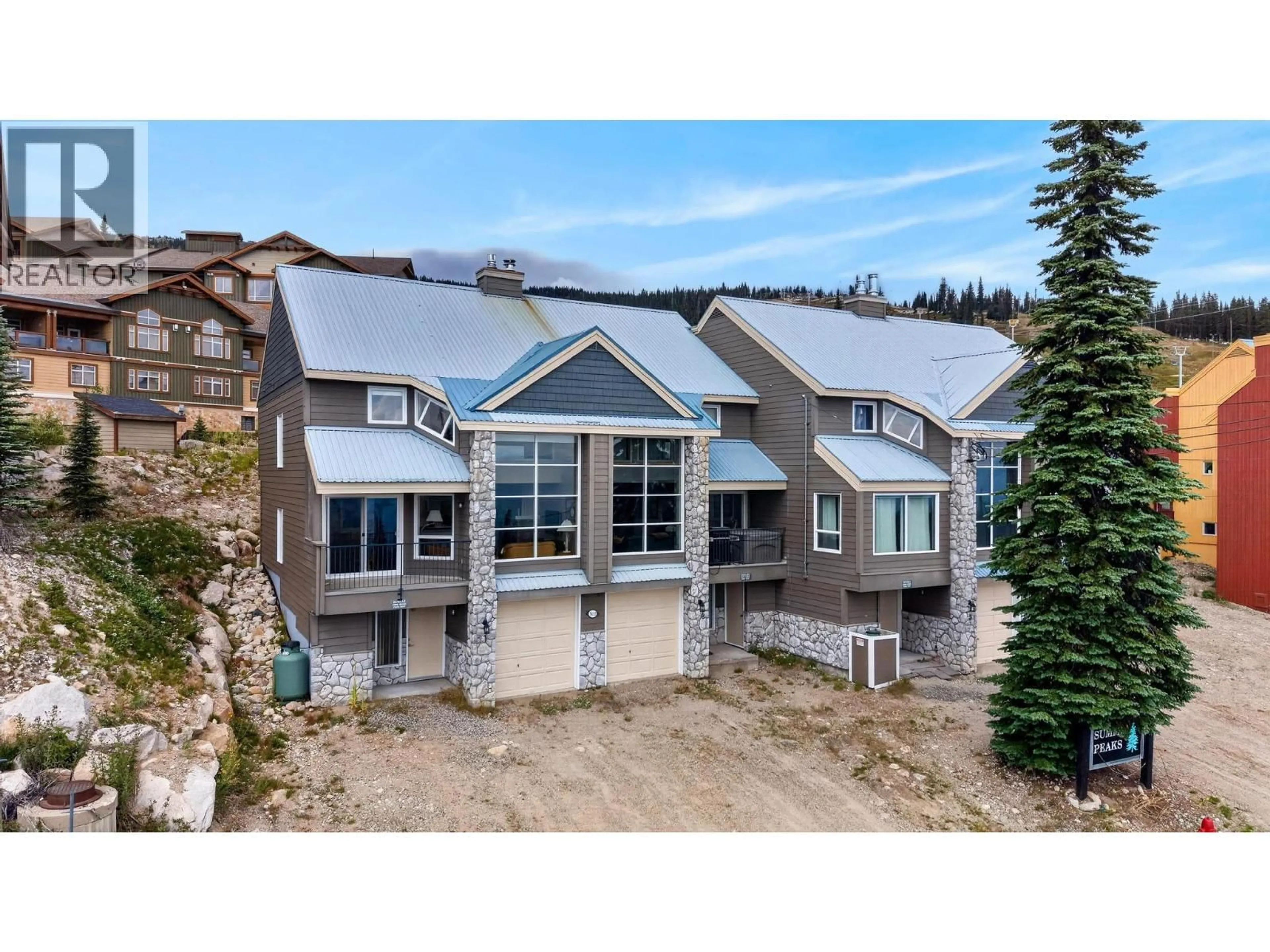 A pic from outside/outdoor area/front of a property/back of a property/a pic from drone, mountain view for 1 - 7615 PORCUPINE ROAD, Big White British Columbia V1P1T4