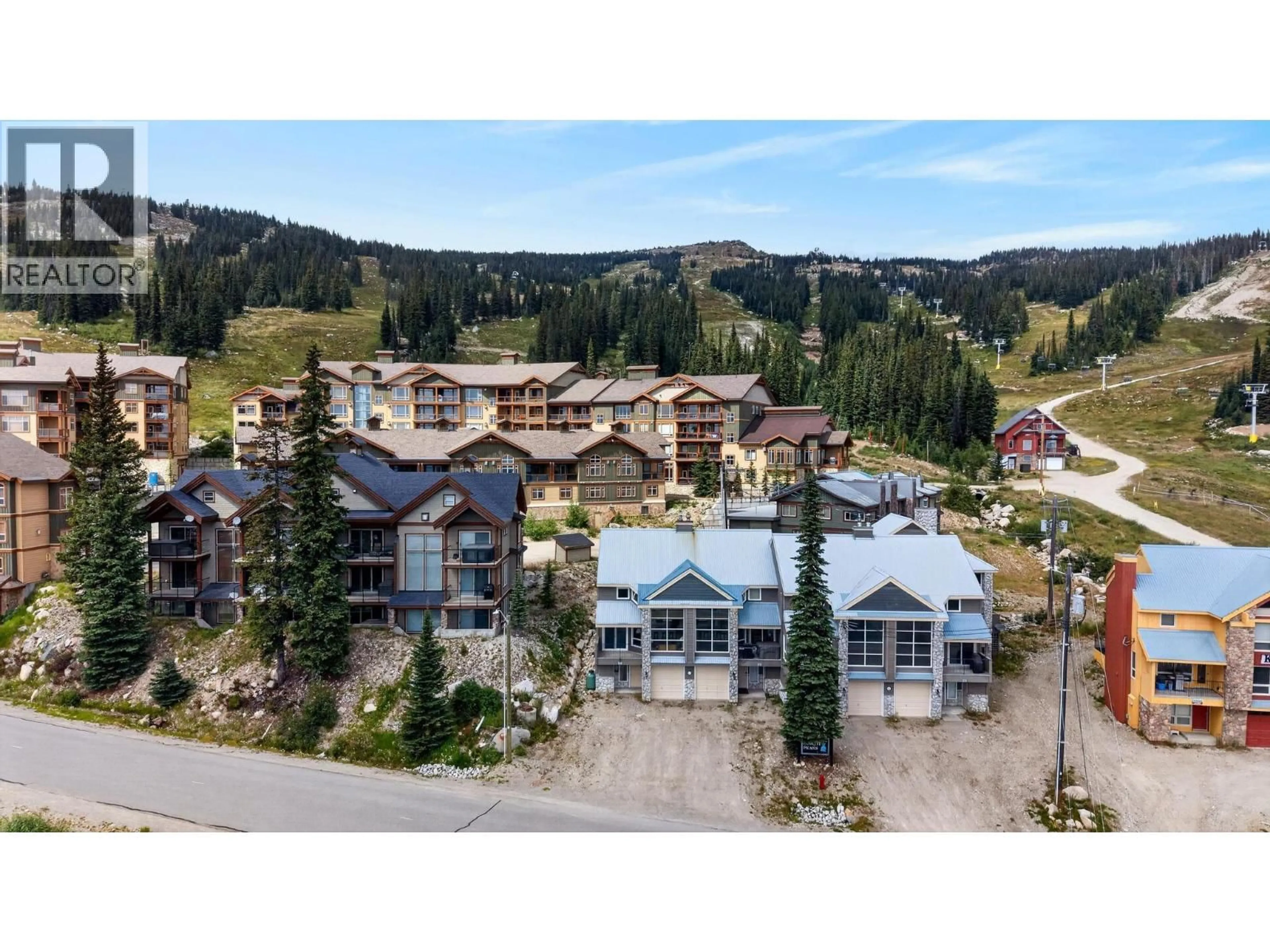A pic from outside/outdoor area/front of a property/back of a property/a pic from drone, mountain view for 1 - 7615 PORCUPINE ROAD, Big White British Columbia V1P1T4
