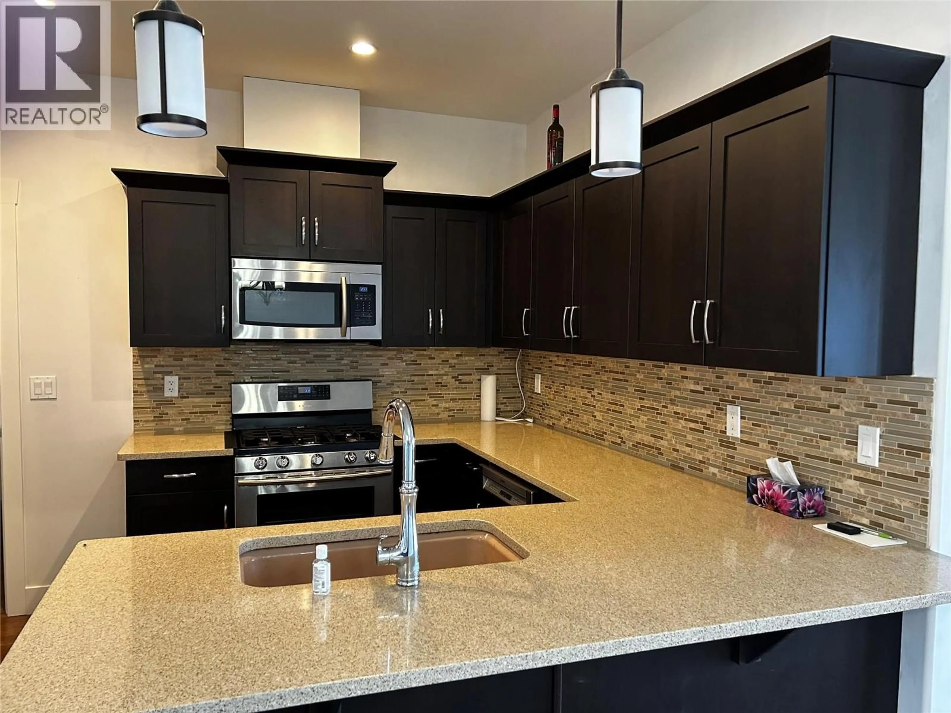 Contemporary kitchen, ceramic/tile floor for 15 - 1040 MT REVELSTOKE PLACE, Vernon British Columbia V1B4E3