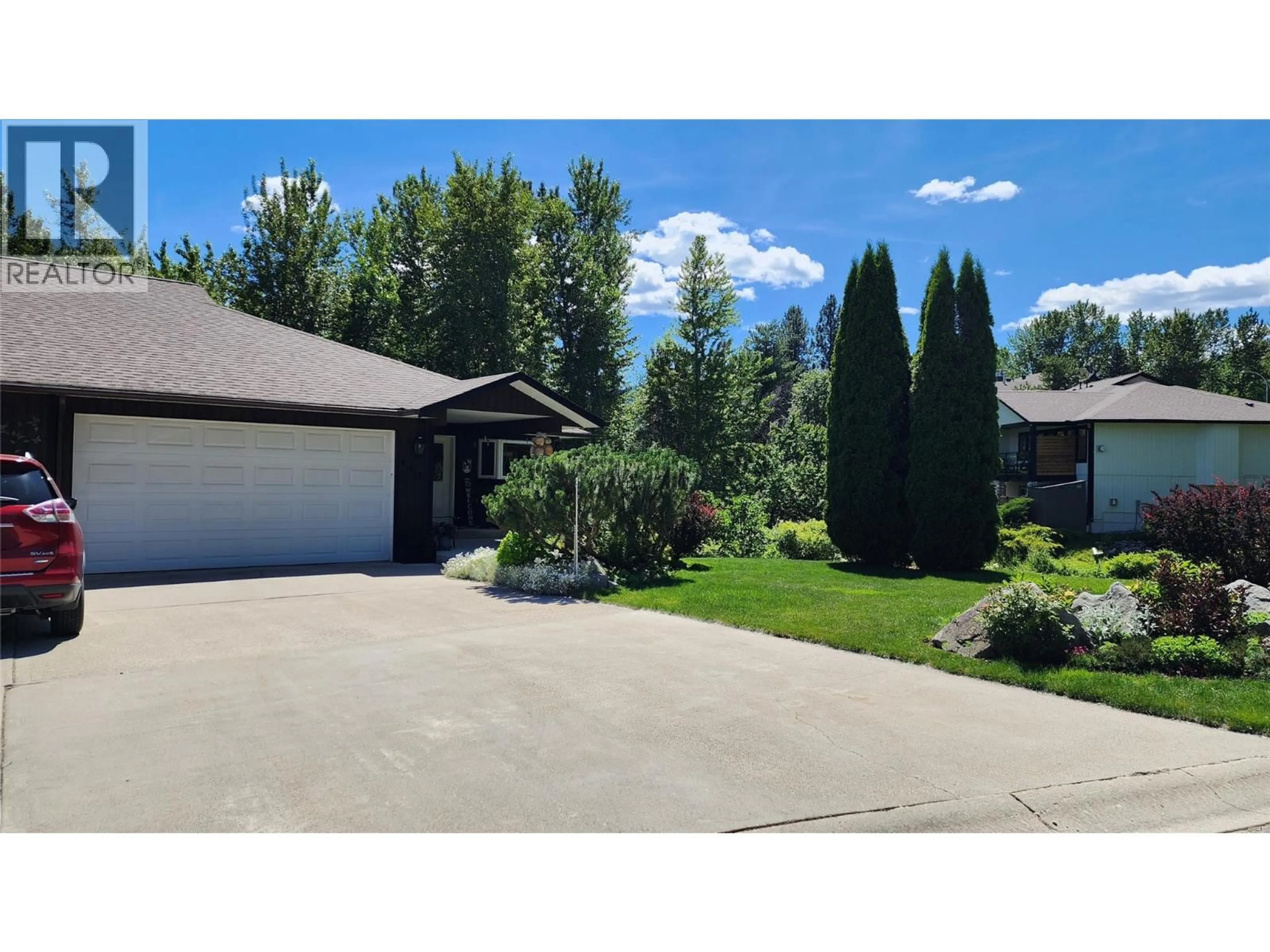 A pic from outside/outdoor area/front of a property/back of a property/a pic from drone, street for 442 WHITMAN WAY, Warfield British Columbia V1R4T9