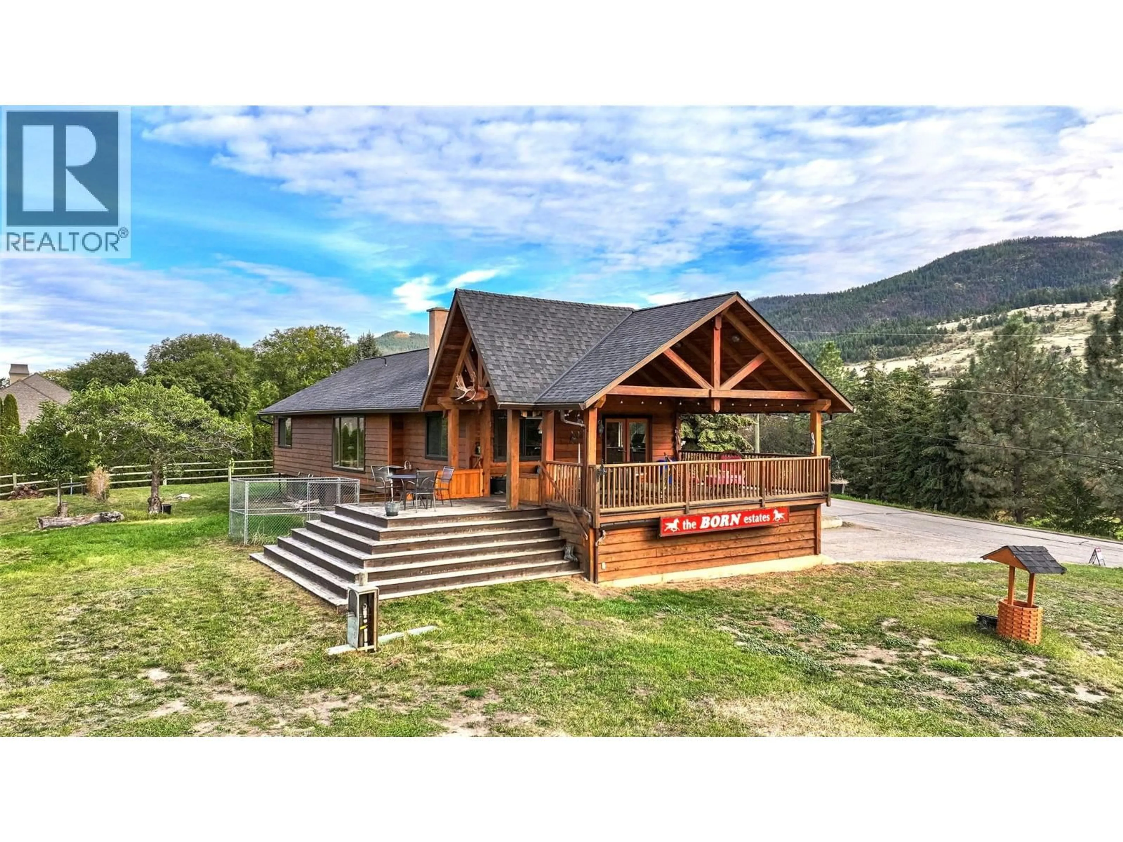 A pic from outside/outdoor area/front of a property/back of a property/a pic from drone, mountain view for 9109 MACKIE DRIVE, Coldstream British Columbia V1B1H1