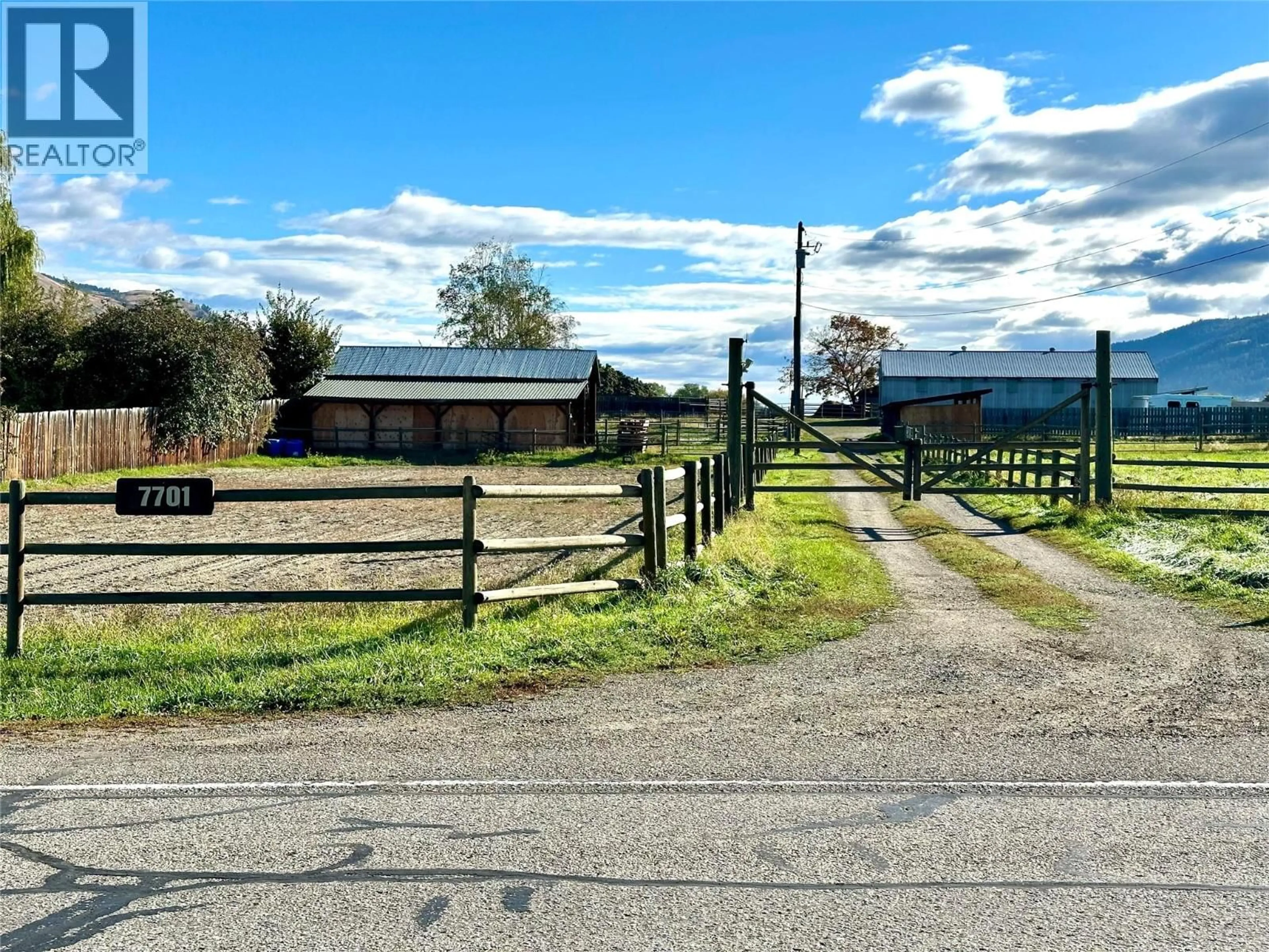 A pic from outside/outdoor area/front of a property/back of a property/a pic from drone, mountain view for 9109 MACKIE DRIVE, Coldstream British Columbia V1B1H1