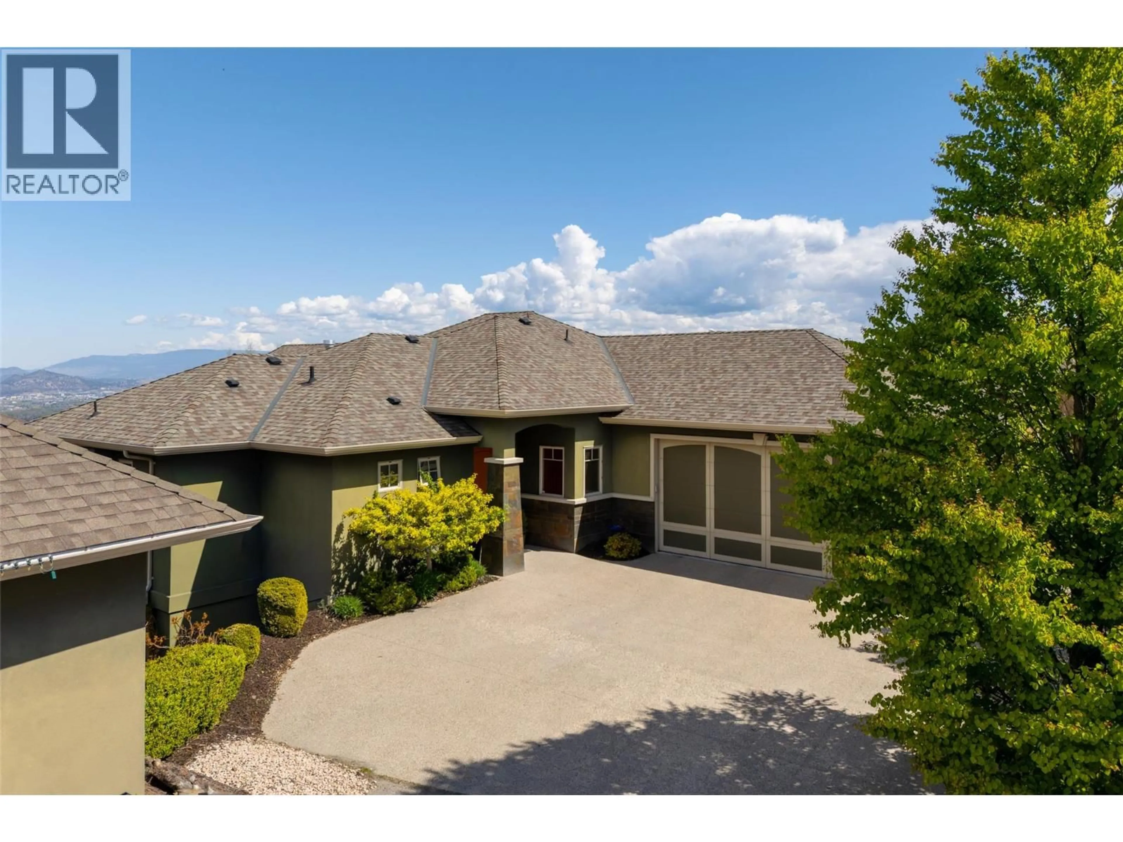 A pic from outside/outdoor area/front of a property/back of a property/a pic from drone, mountain view for 742 CROZIER AVENUE, Kelowna British Columbia V1W5H4