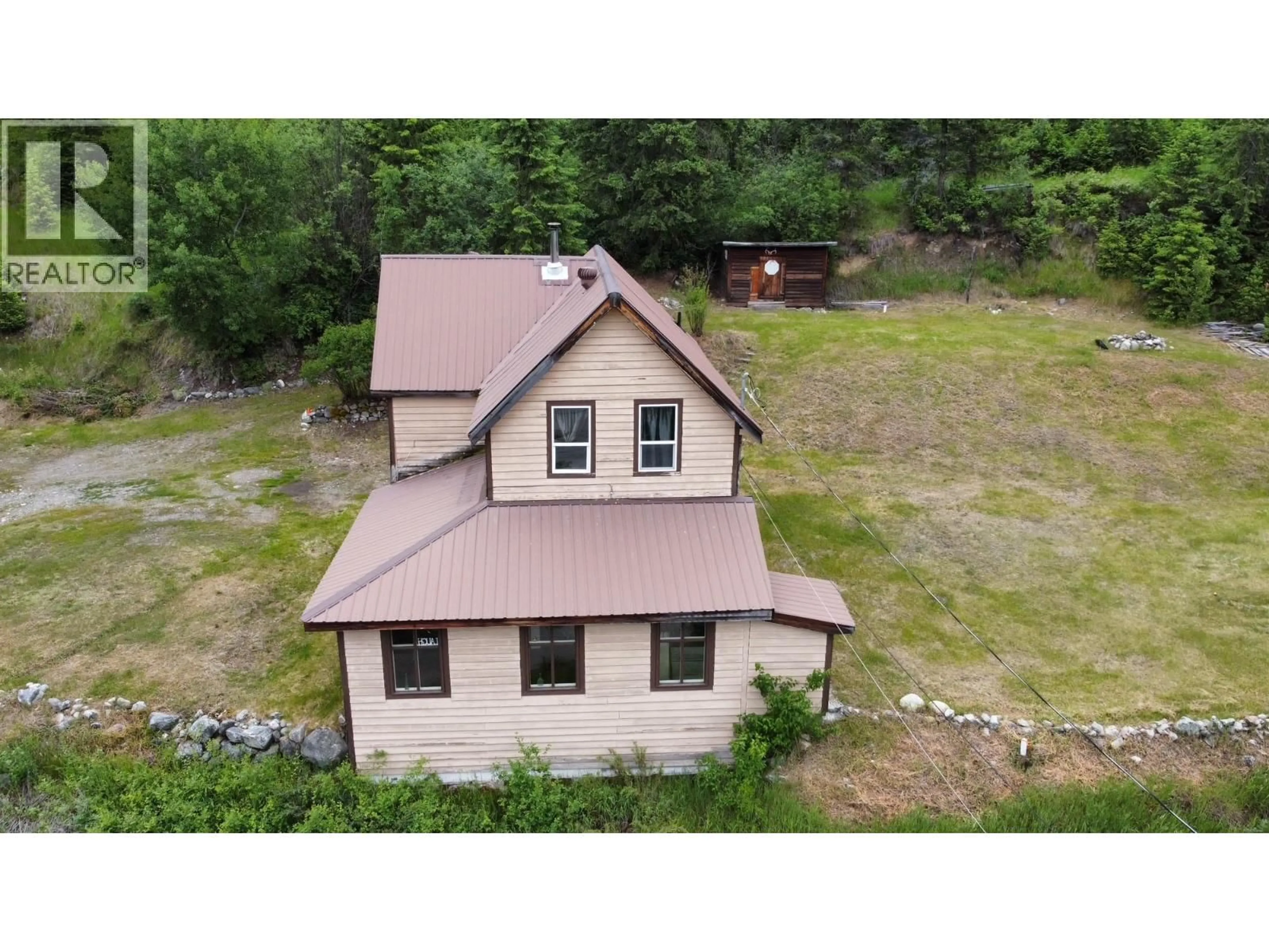 A pic from outside/outdoor area/front of a property/back of a property/a pic from drone, building for 456 LONG LAKE AVENUE, Greenwood British Columbia V0H1J0
