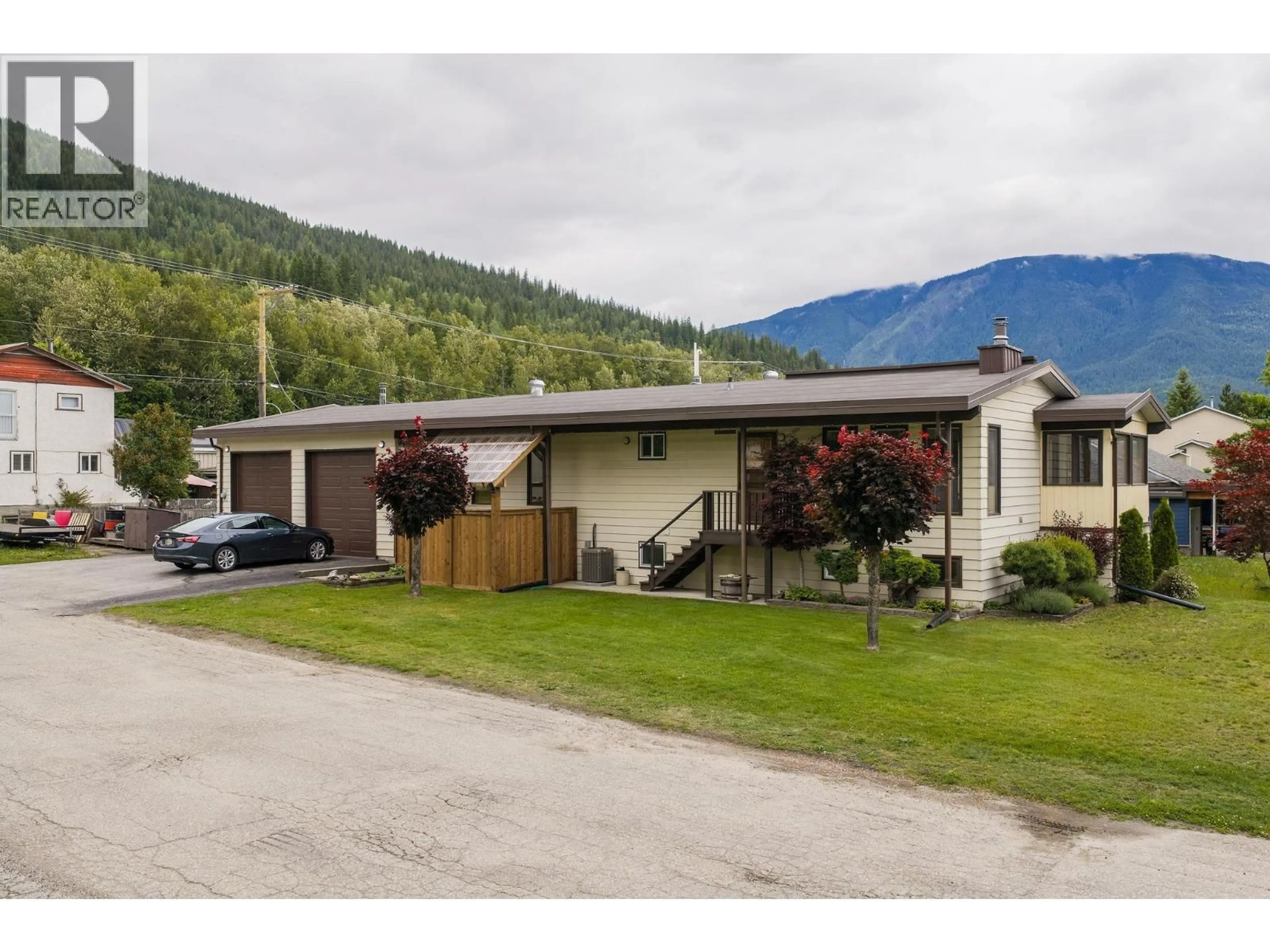 A pic from outside/outdoor area/front of a property/back of a property/a pic from drone, mountain view for 108 FORD STREET, Revelstoke British Columbia V0E2S0