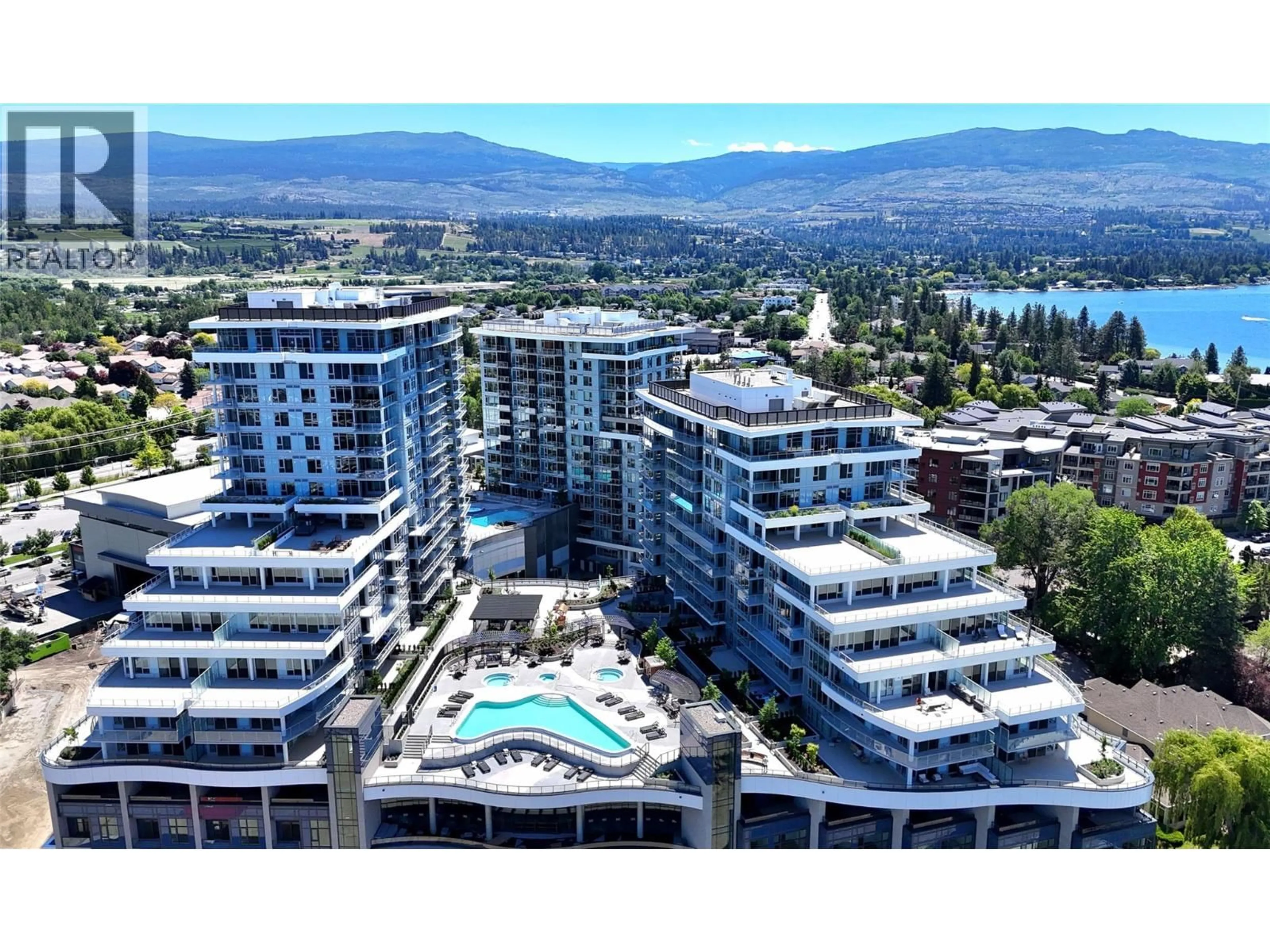 A pic from outside/outdoor area/front of a property/back of a property/a pic from drone, mountain view for 601 - 3700 CAPOZZI ROAD, Kelowna British Columbia V1W0G3