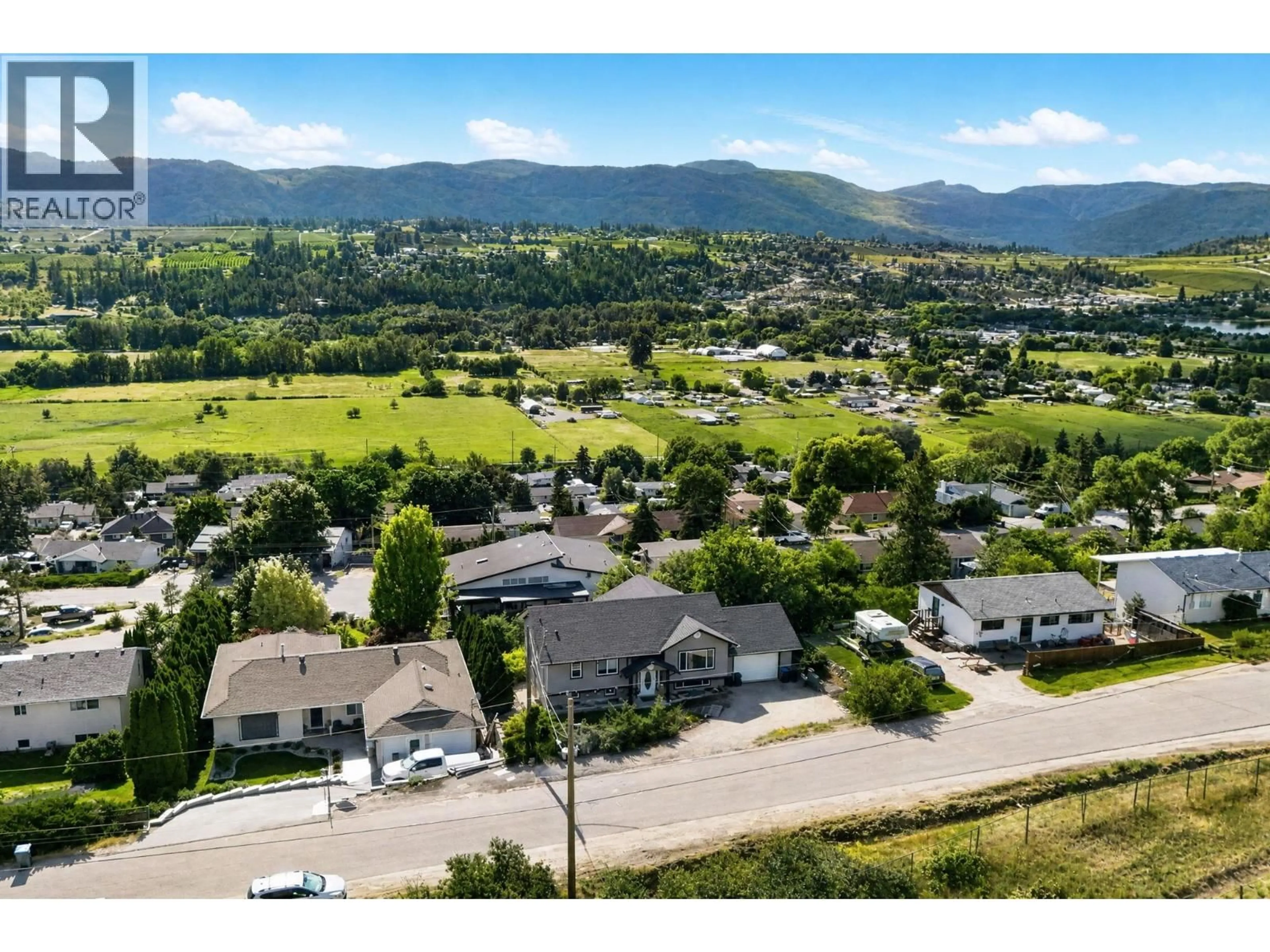 A pic from outside/outdoor area/front of a property/back of a property/a pic from drone, mountain view for 10910 VELDA ROAD, Lake Country British Columbia V4V1W7