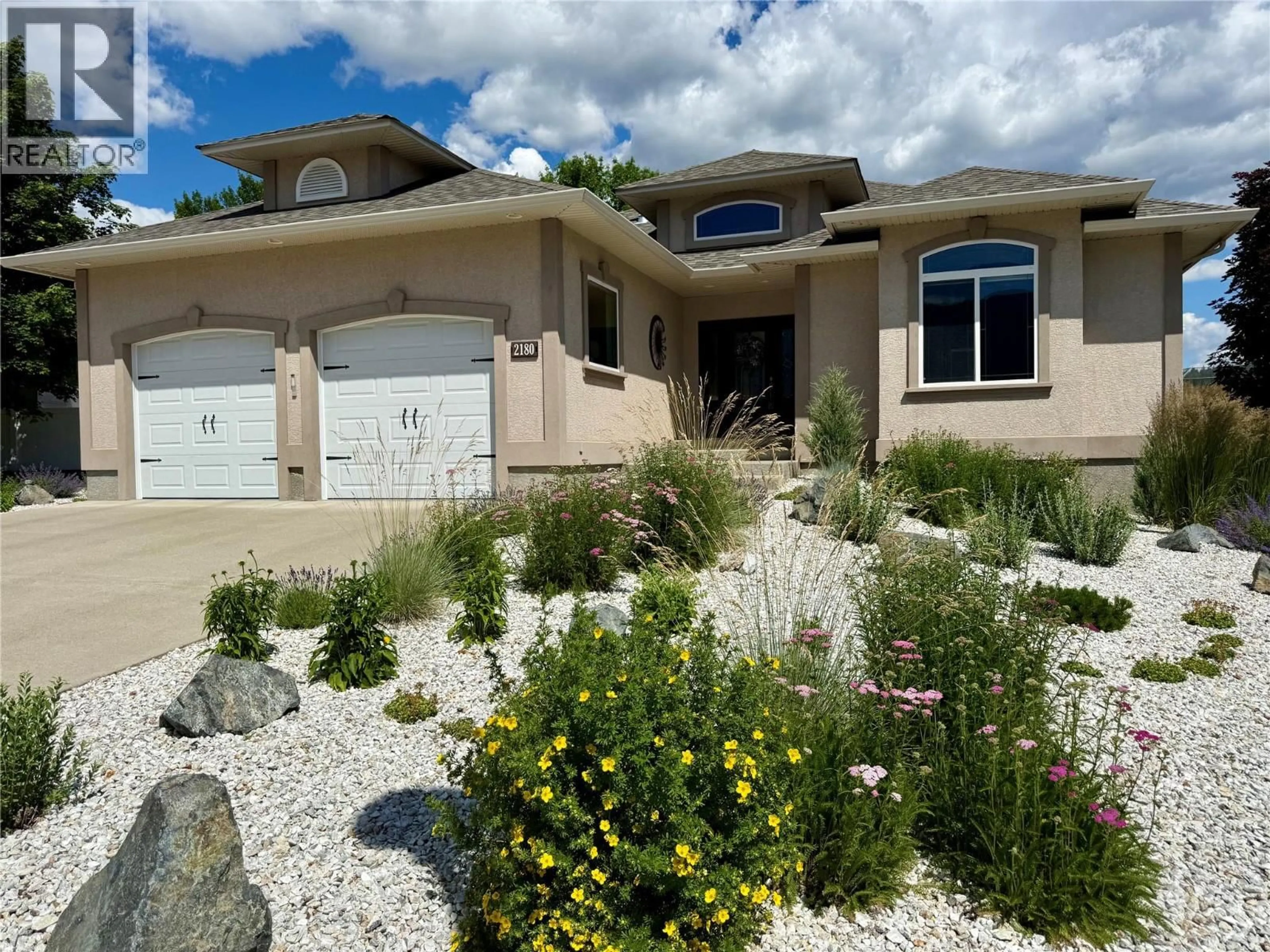 Home with vinyl exterior material, street for 2180 BRYCEN PLACE, Grand Forks British Columbia V0H1H0