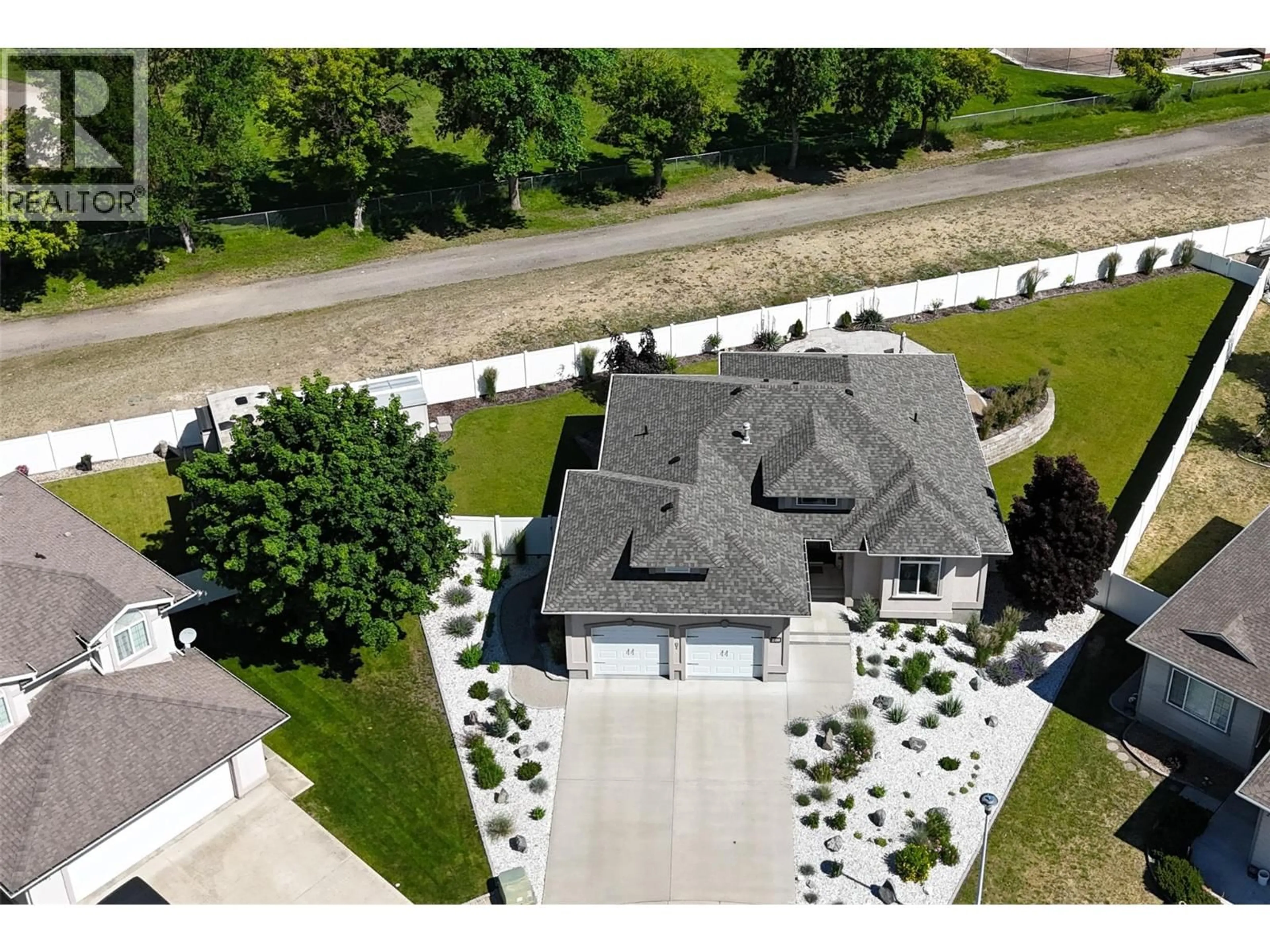 A pic from outside/outdoor area/front of a property/back of a property/a pic from drone, street for 2180 BRYCEN PLACE, Grand Forks British Columbia V0H1H0