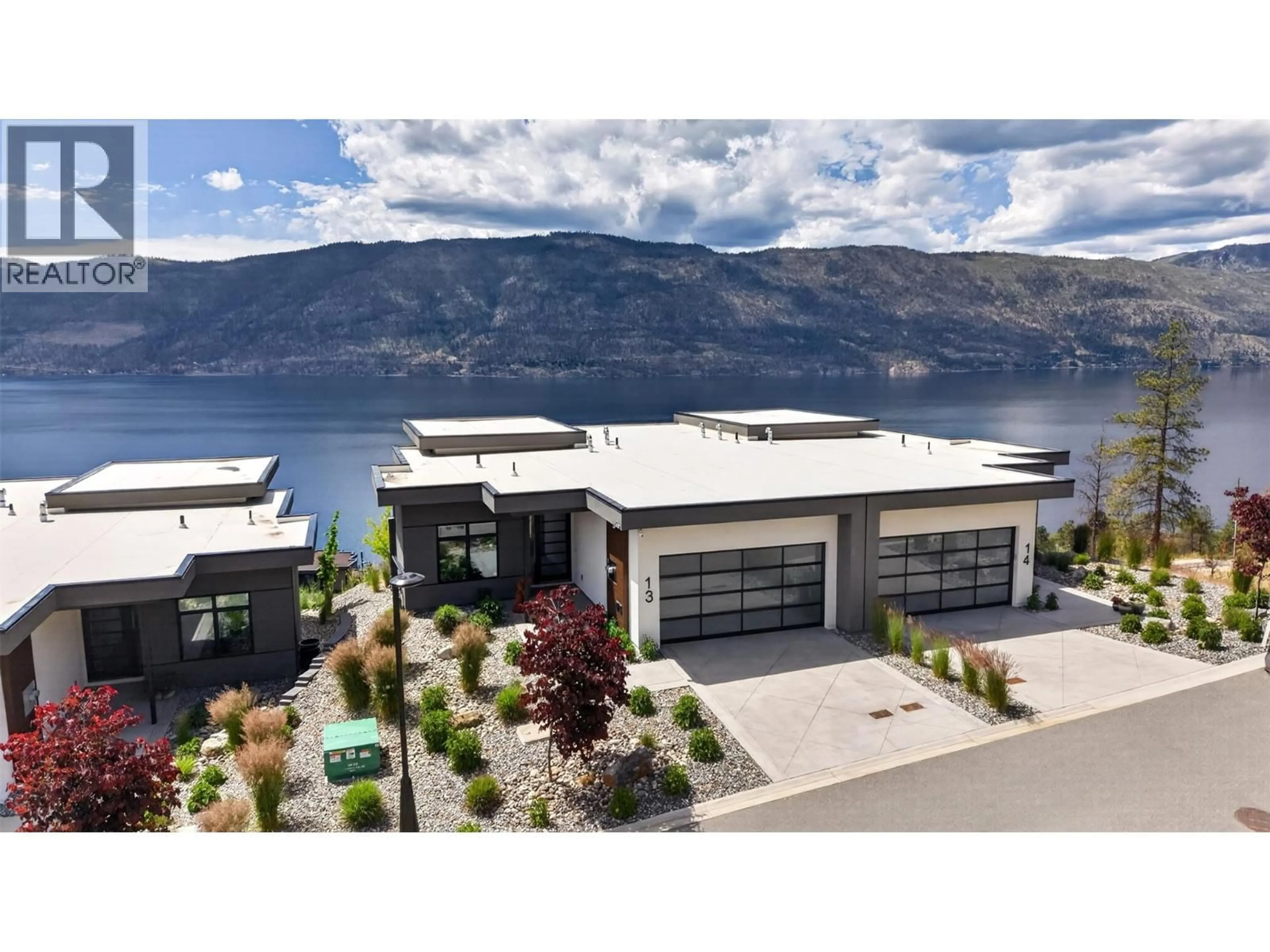 A pic from outside/outdoor area/front of a property/back of a property/a pic from drone, water/lake/river/ocean view for 13 - 9201 OKANAGAN CENTRE ROAD WEST, Lake Country British Columbia V4V0B8