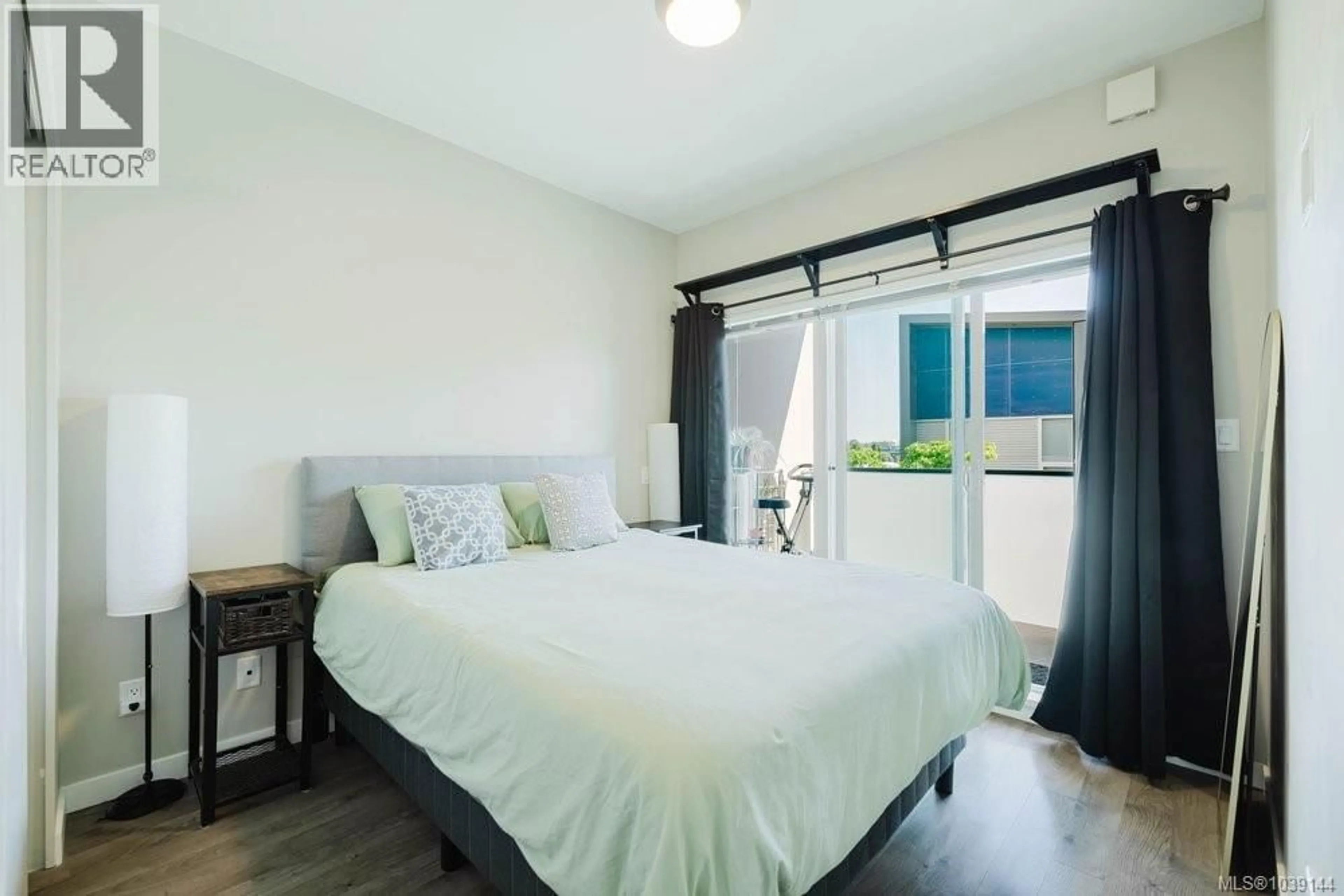 Bedroom with bed, wood/laminate floor for 316 - 767 TYEE ROAD, Victoria British Columbia V9A0G5