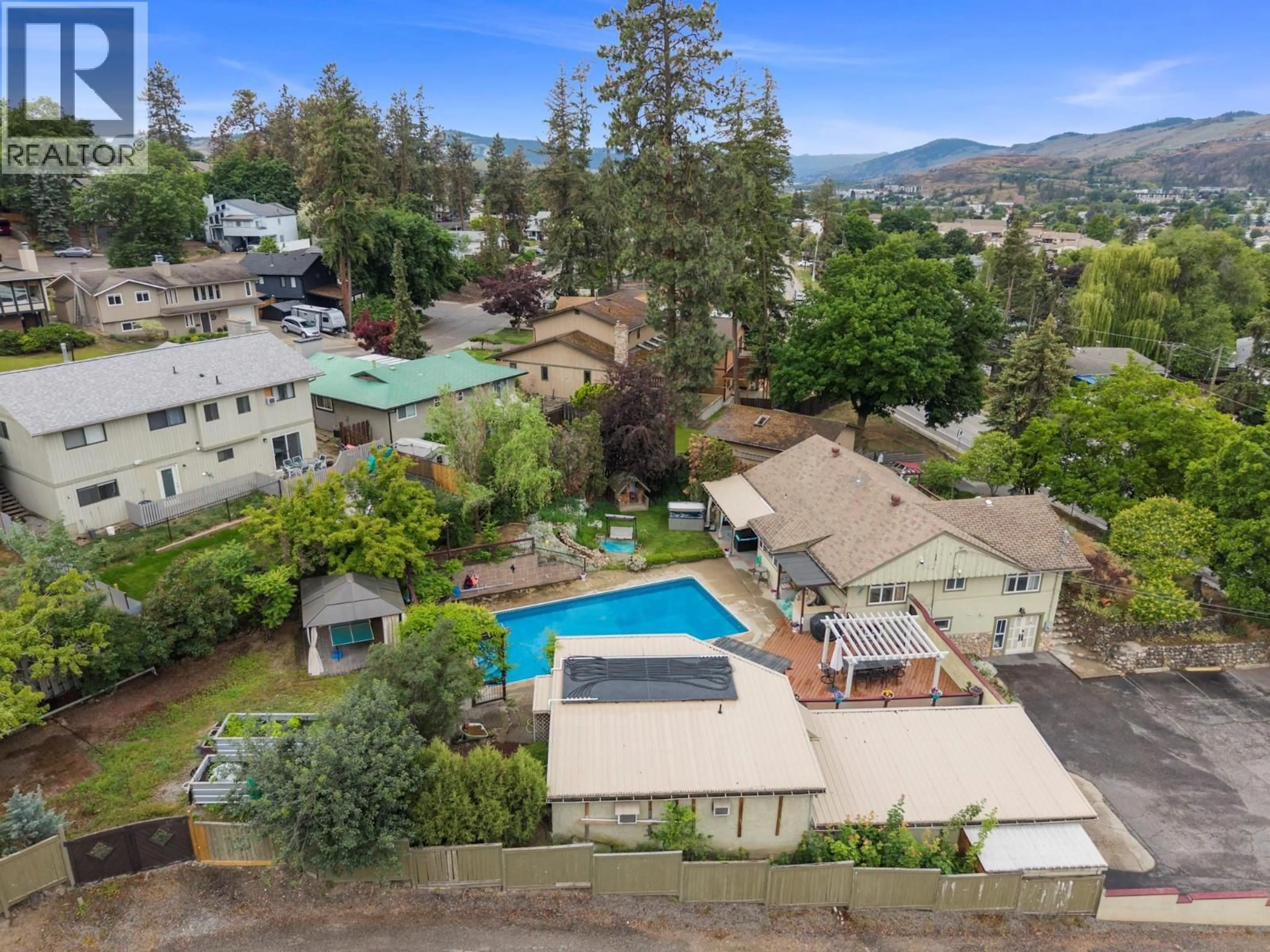 A pic from outside/outdoor area/front of a property/back of a property/a pic from drone, mountain view for 4105 PLEASANT VALLEY ROAD, Vernon British Columbia V1T4M1