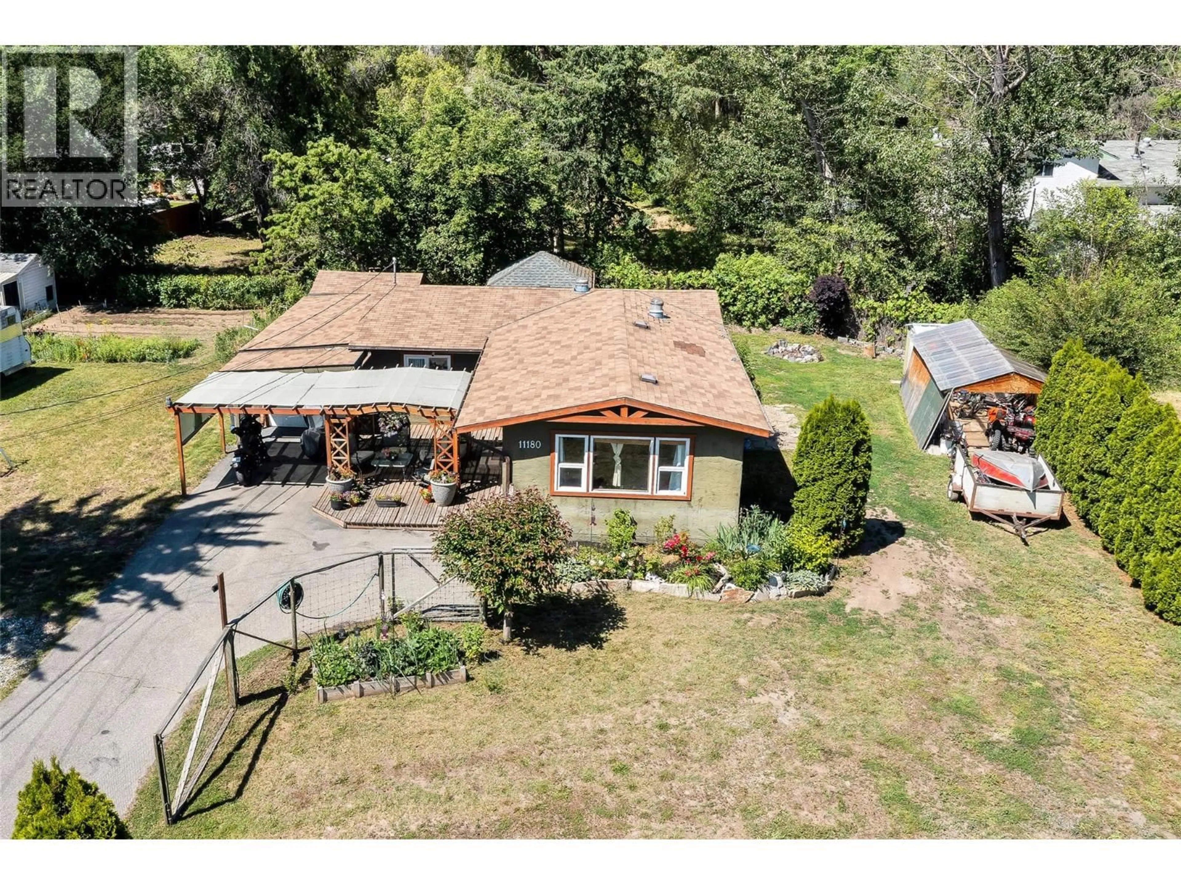 A pic from outside/outdoor area/front of a property/back of a property/a pic from drone, unknown for 11180 BOTTOM WOOD LAKE ROAD, Lake Country British Columbia V4V1V9