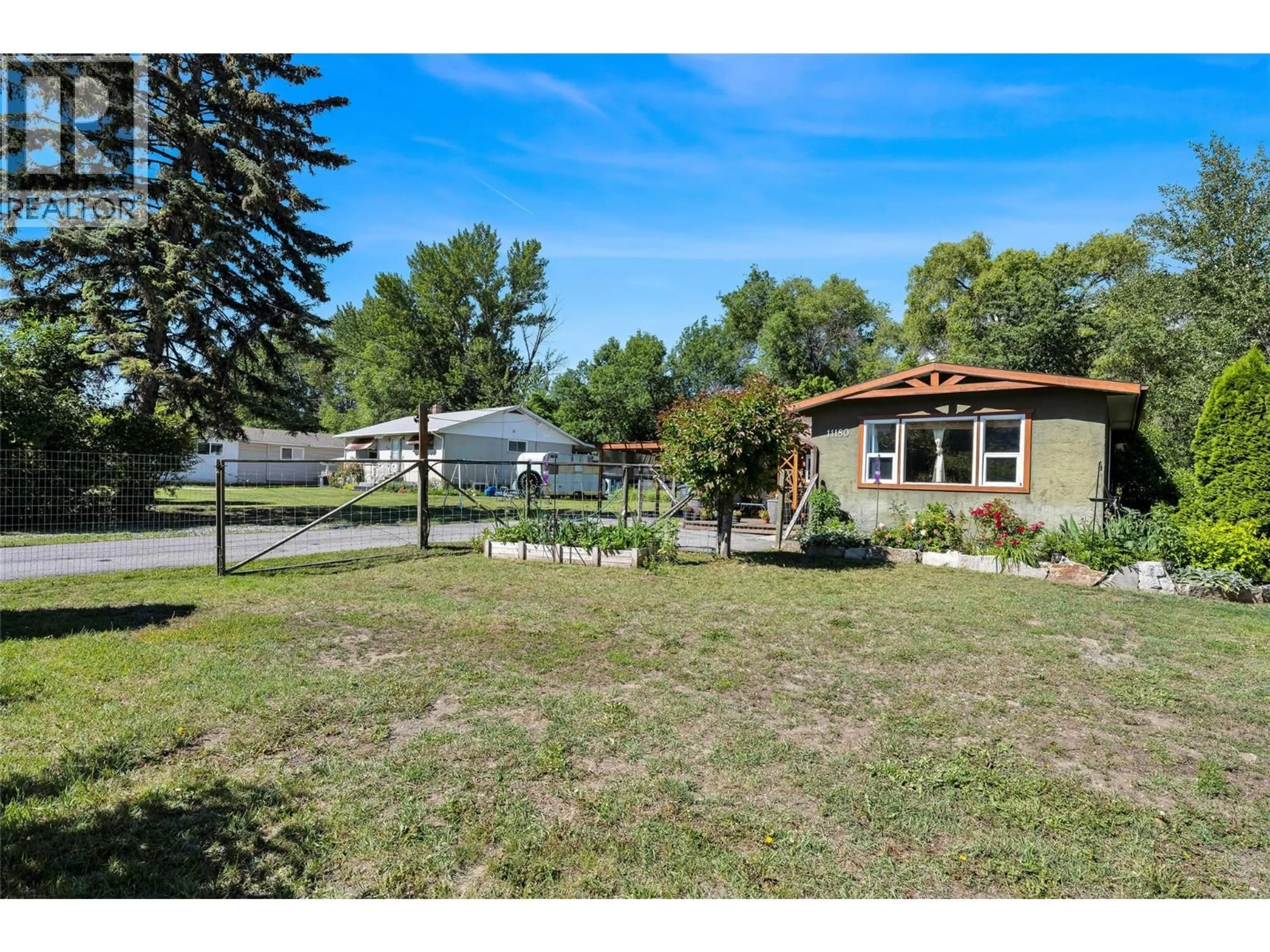 A pic from outside/outdoor area/front of a property/back of a property/a pic from drone, unknown for 11180 BOTTOM WOOD LAKE ROAD, Lake Country British Columbia V4V1V9