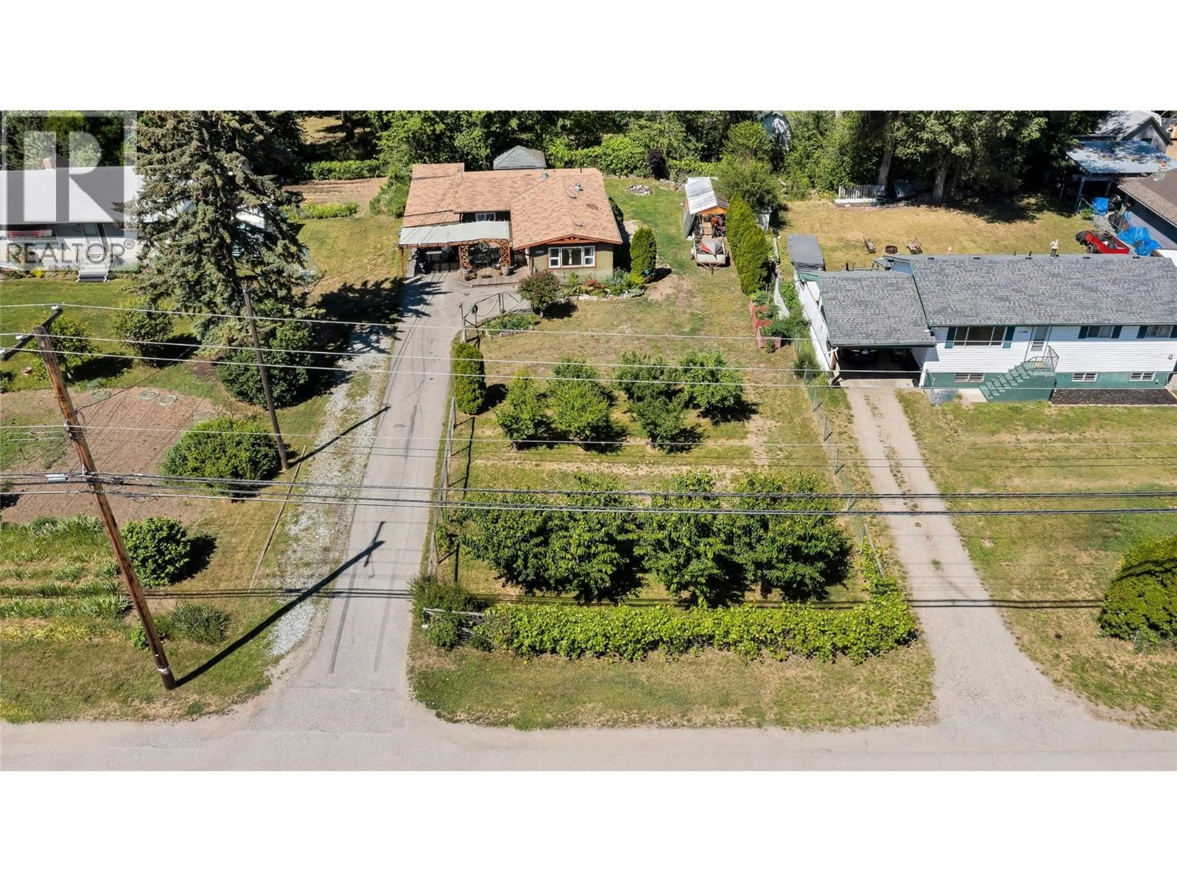 A pic from outside/outdoor area/front of a property/back of a property/a pic from drone, street for 11180 BOTTOM WOOD LAKE ROAD, Lake Country British Columbia V4V1V9