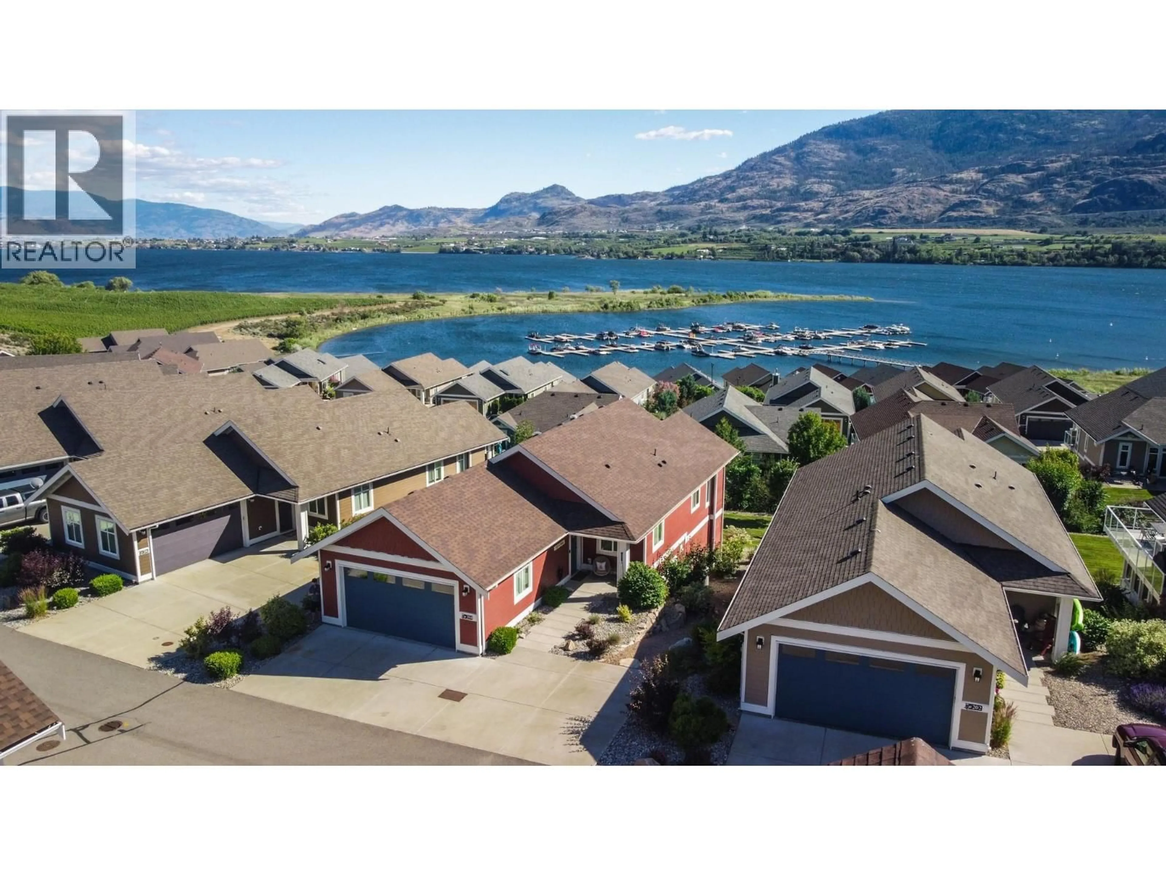 A pic from outside/outdoor area/front of a property/back of a property/a pic from drone, water/lake/river/ocean view for 204 - 2450 RADIO TOWER ROAD, Oliver British Columbia V0H1T1