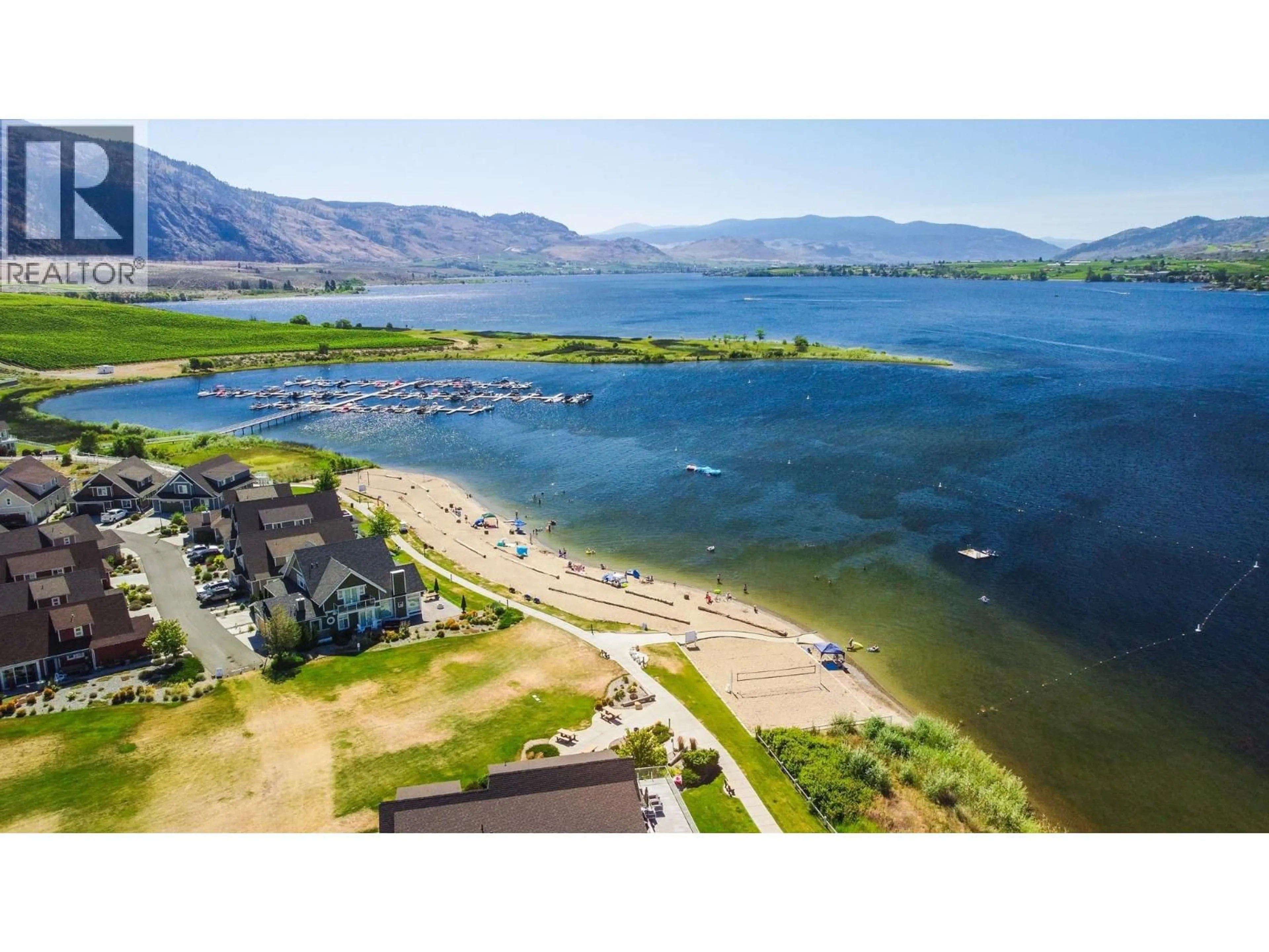 A pic from outside/outdoor area/front of a property/back of a property/a pic from drone, water/lake/river/ocean view for 204 - 2450 RADIO TOWER ROAD, Oliver British Columbia V0H1T1