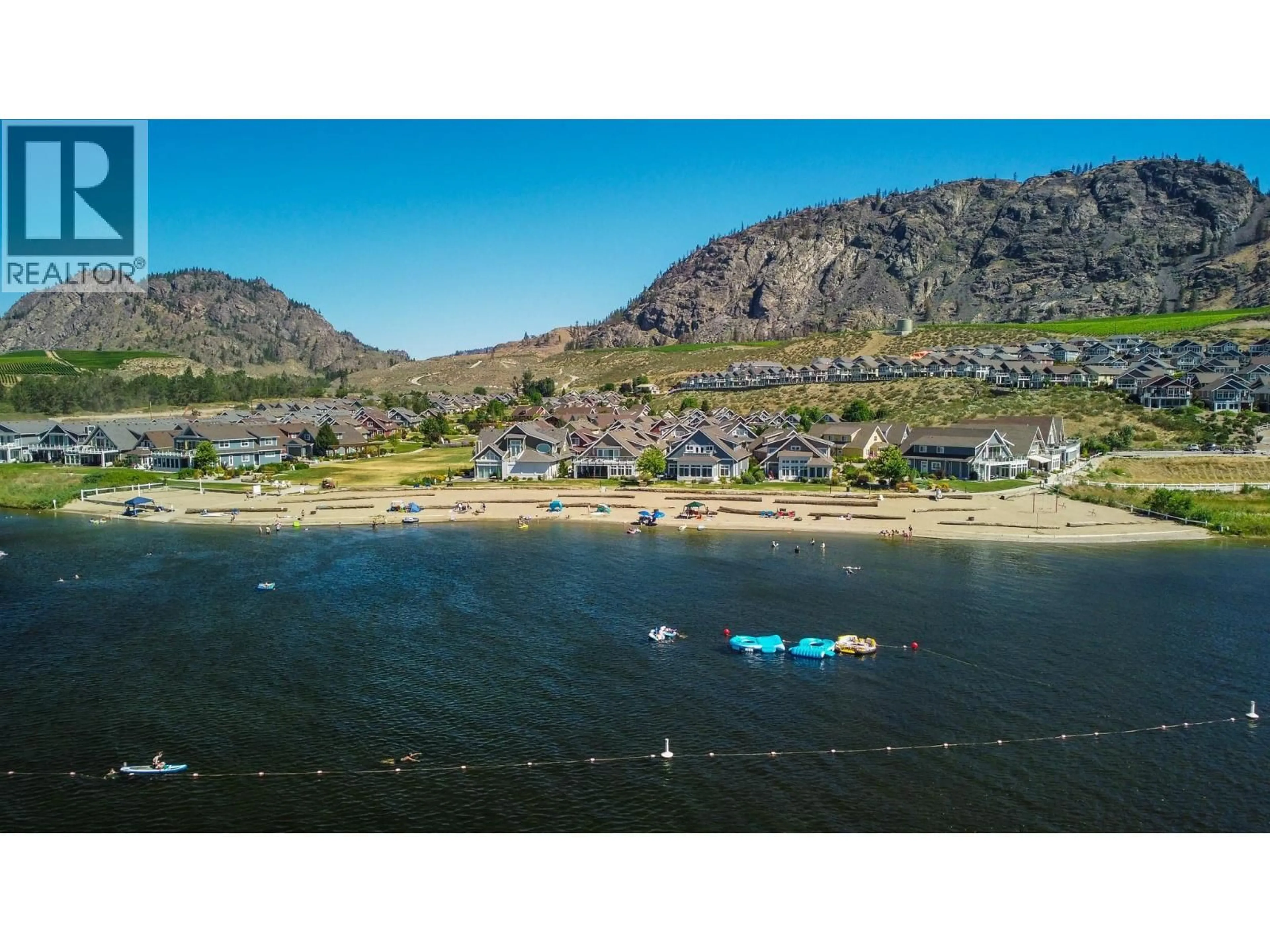 A pic from outside/outdoor area/front of a property/back of a property/a pic from drone, water/lake/river/ocean view for 204 - 2450 RADIO TOWER ROAD, Oliver British Columbia V0H1T1
