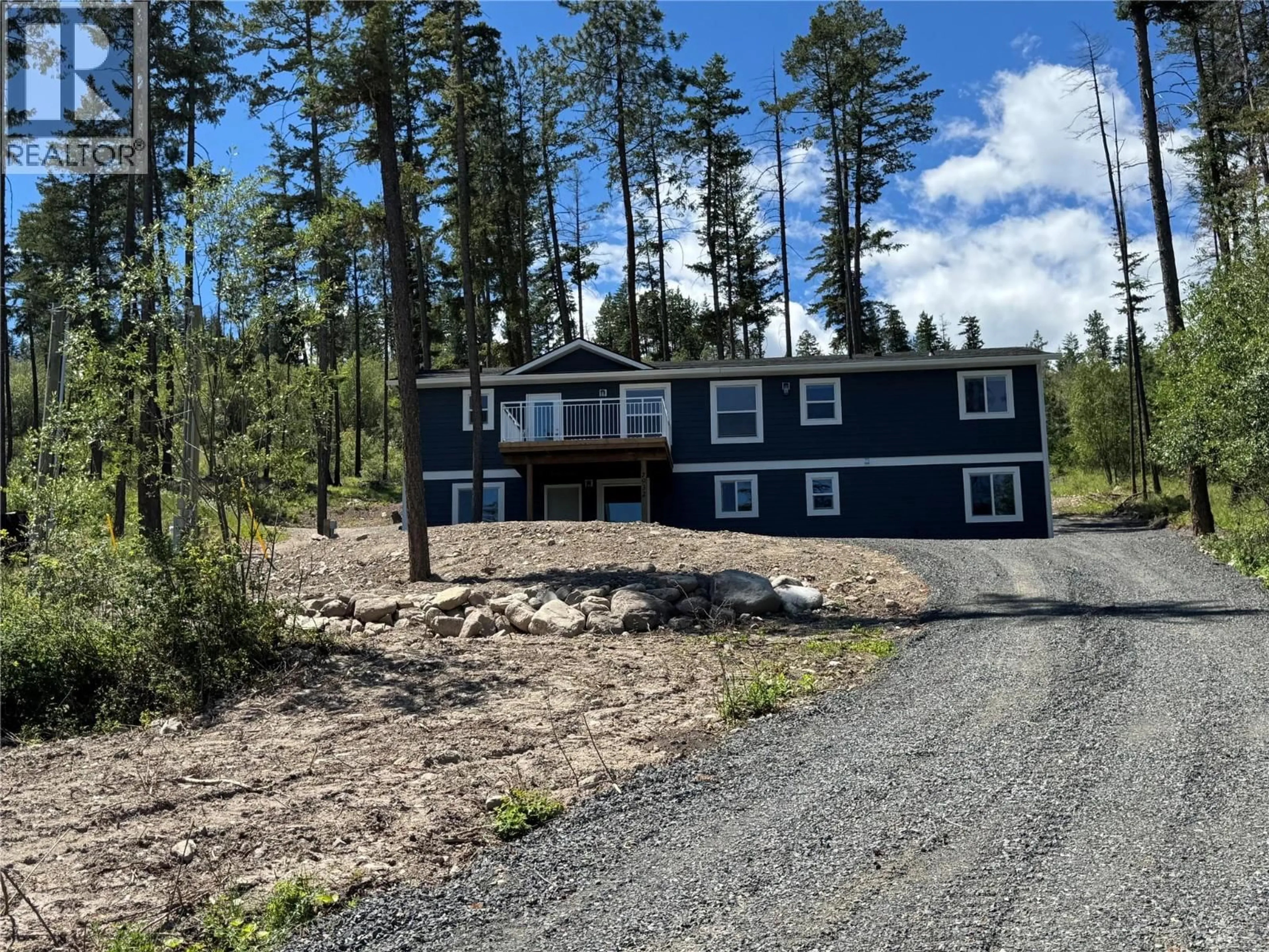 A pic from outside/outdoor area/front of a property/back of a property/a pic from drone, mountain view for 7932 ALPINE ROAD, Kelowna British Columbia V1Z3V4