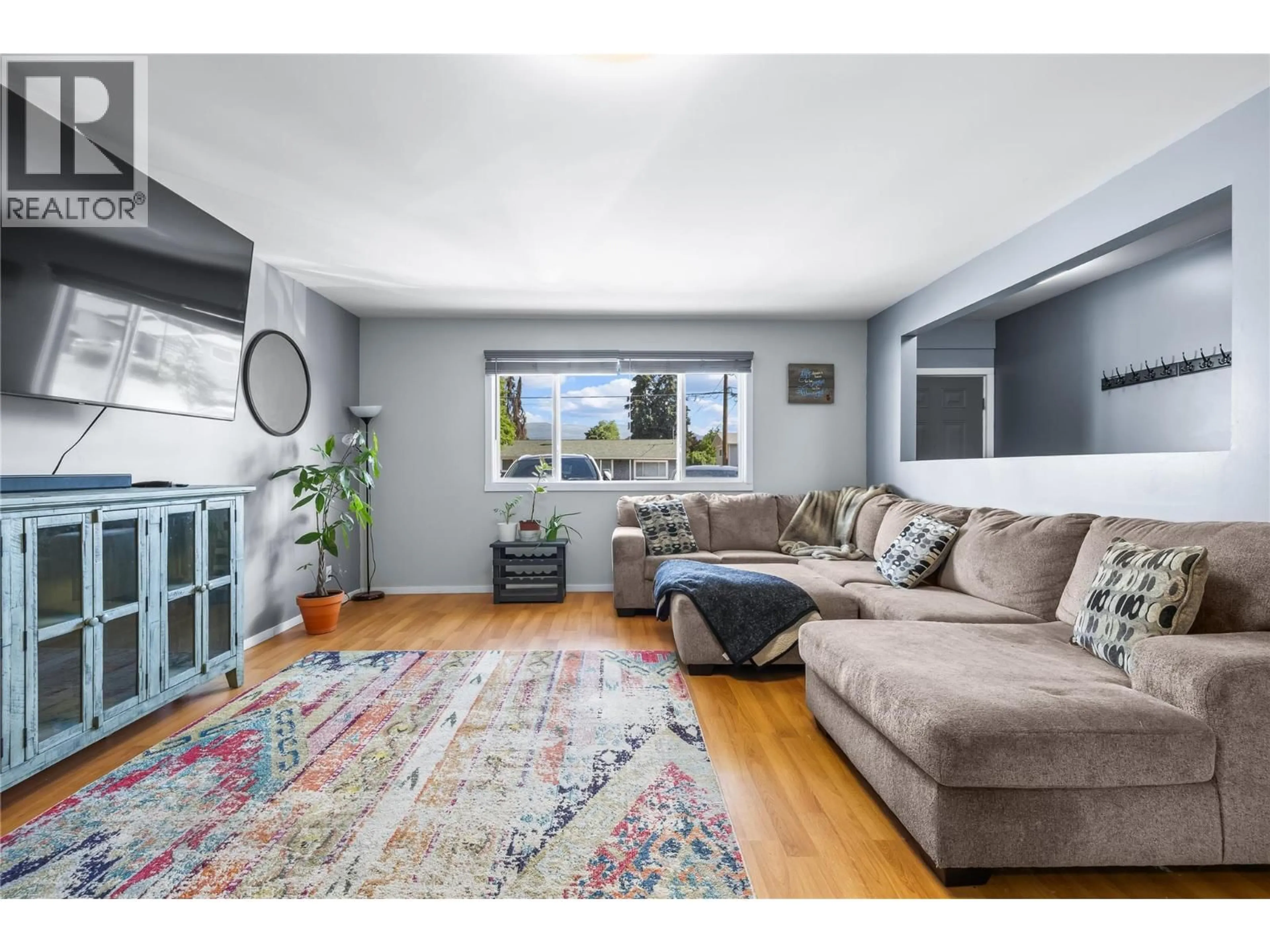 Living room with furniture, unknown for 440 PRIMROSE ROAD, Kelowna British Columbia V1X2G7