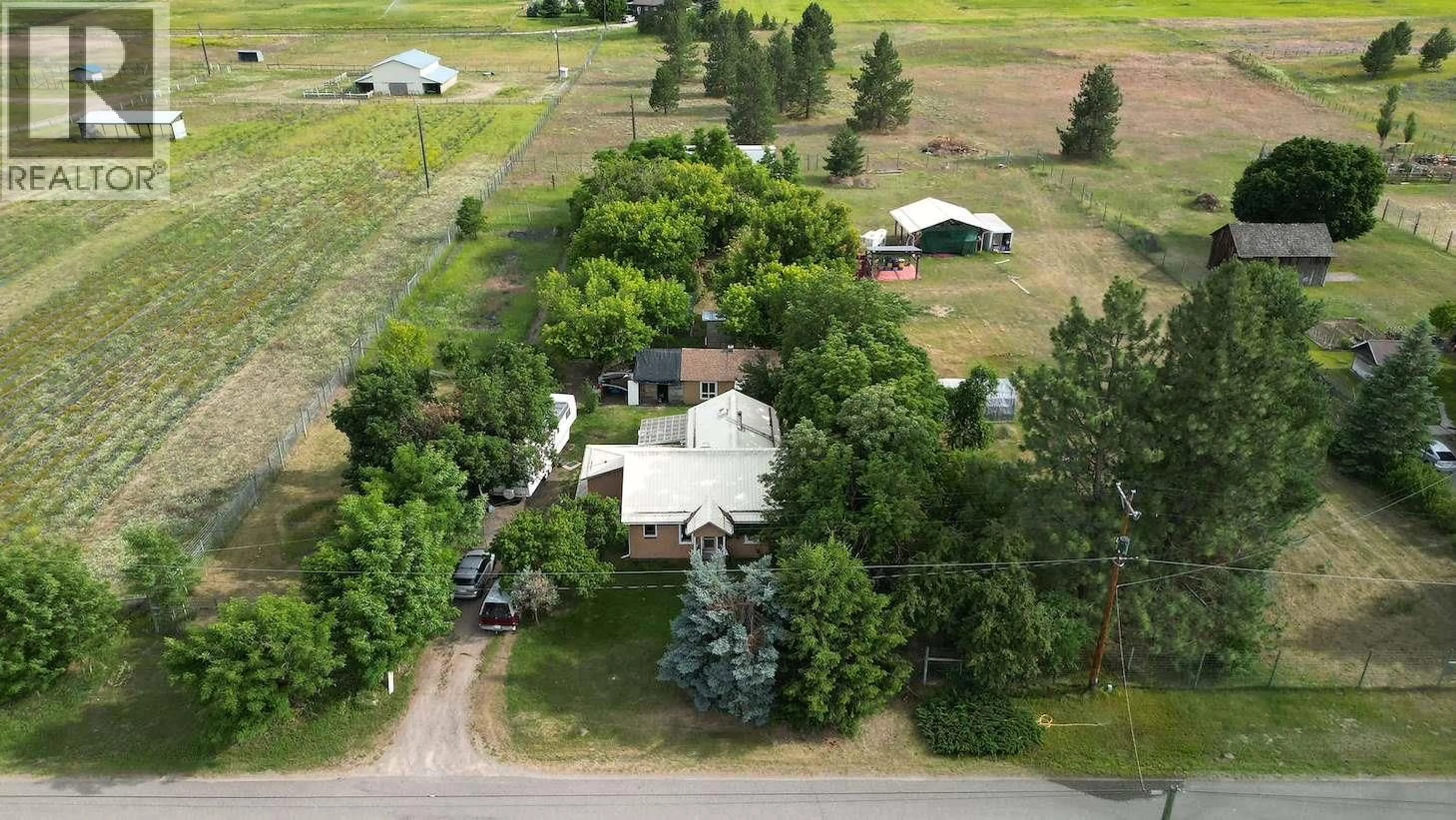 A pic from outside/outdoor area/front of a property/back of a property/a pic from drone, unknown for 780 CAMERON AVENUE, Grand Forks British Columbia V0H1H4