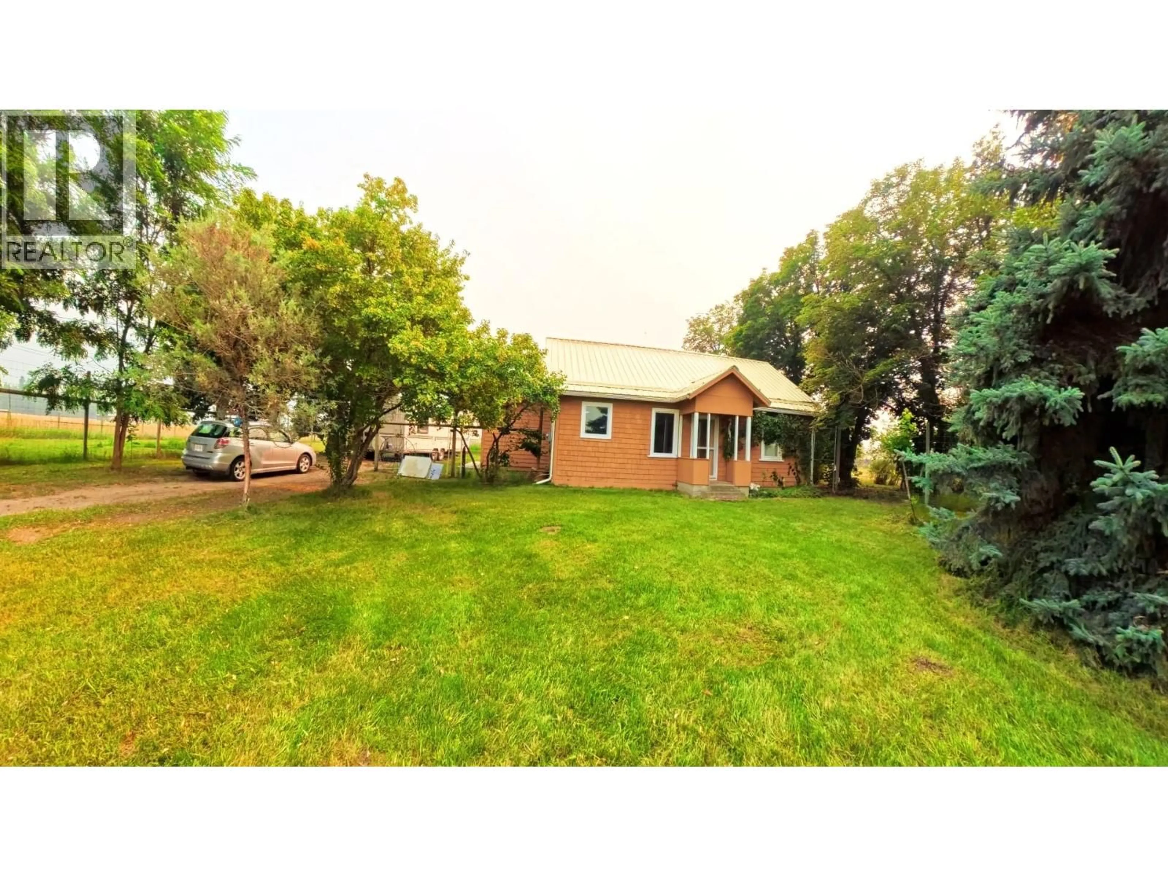A pic from outside/outdoor area/front of a property/back of a property/a pic from drone, unknown for 780 CAMERON AVENUE, Grand Forks British Columbia V0H1H4