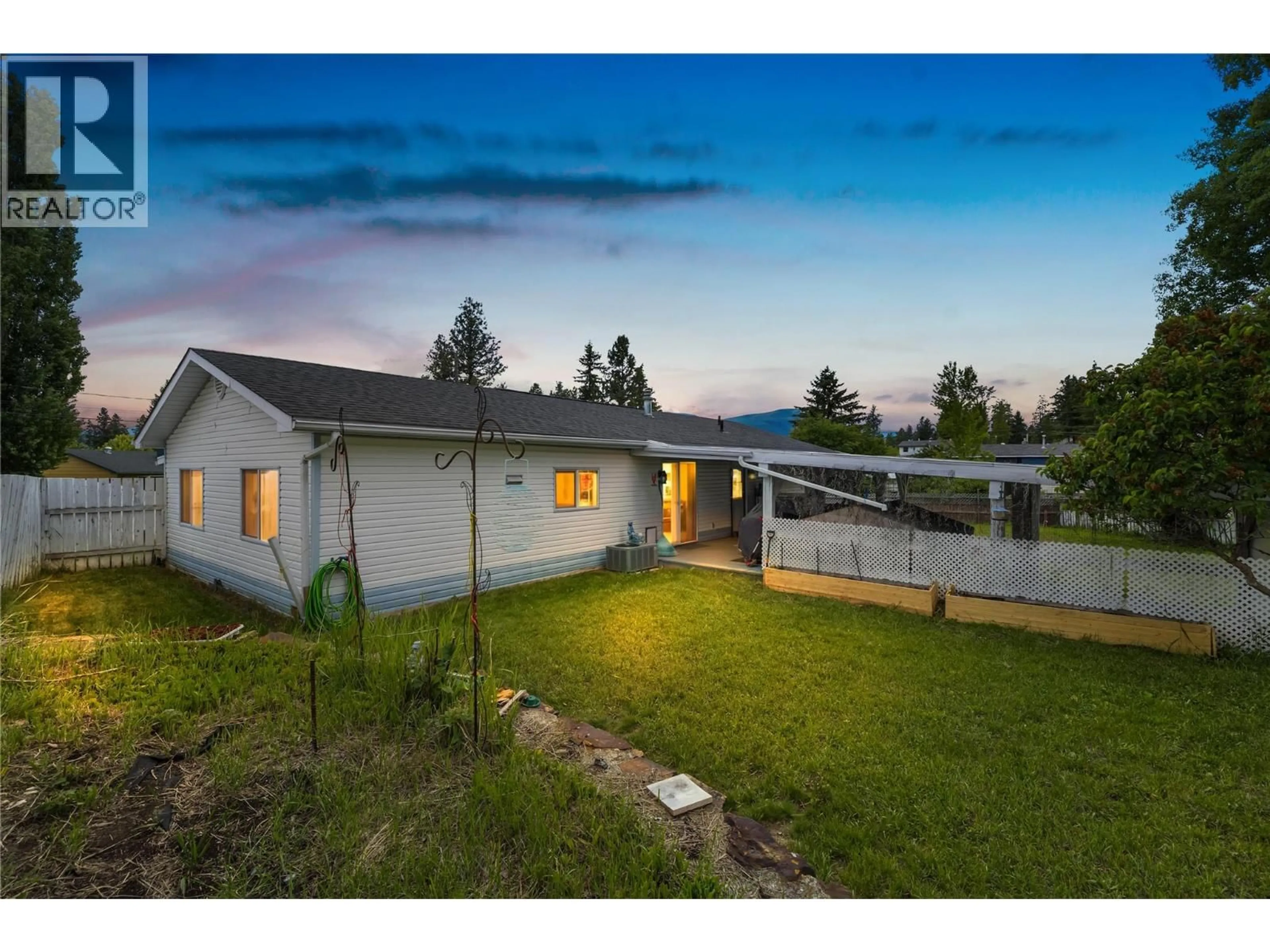 A pic from outside/outdoor area/front of a property/back of a property/a pic from drone, mountain view for 858 301ST STREET, Marysville British Columbia V1A3J9