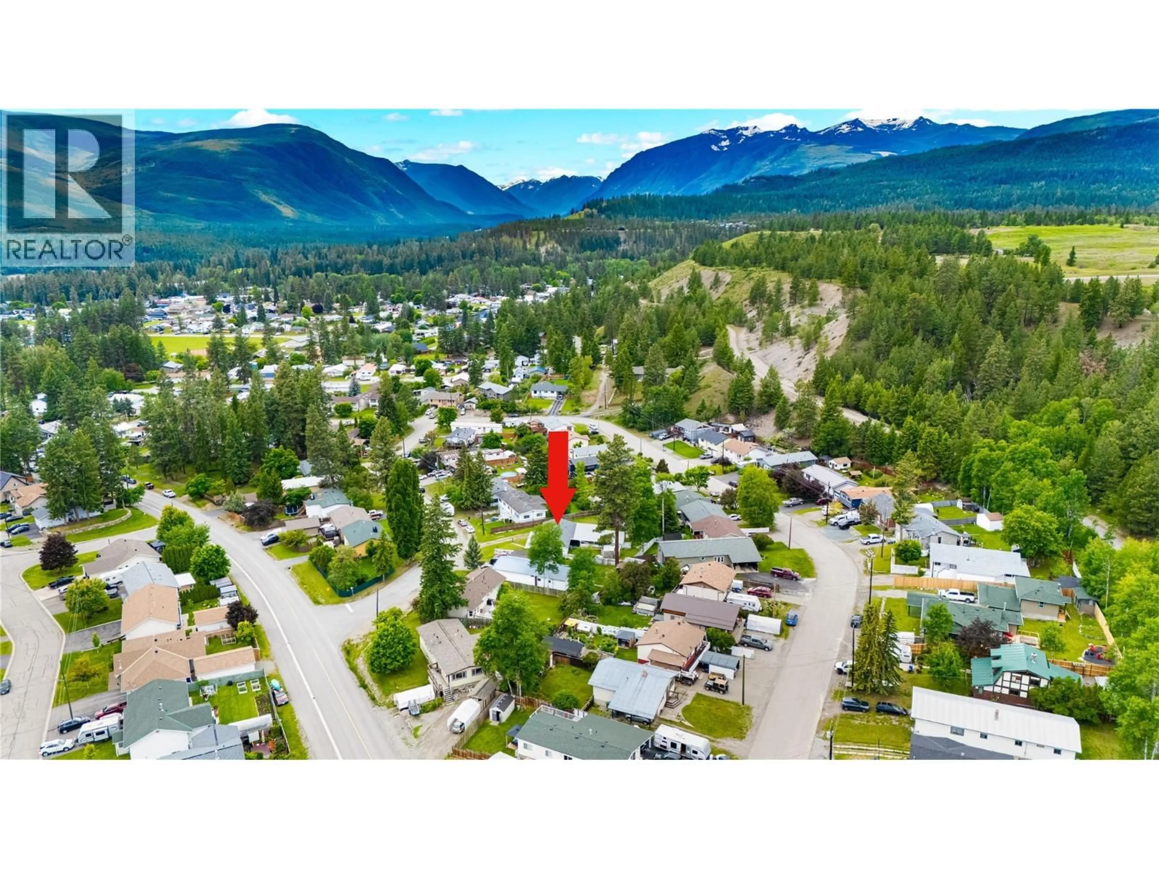 A pic from outside/outdoor area/front of a property/back of a property/a pic from drone, mountain view for 858 301ST STREET, Marysville British Columbia V1A3J9
