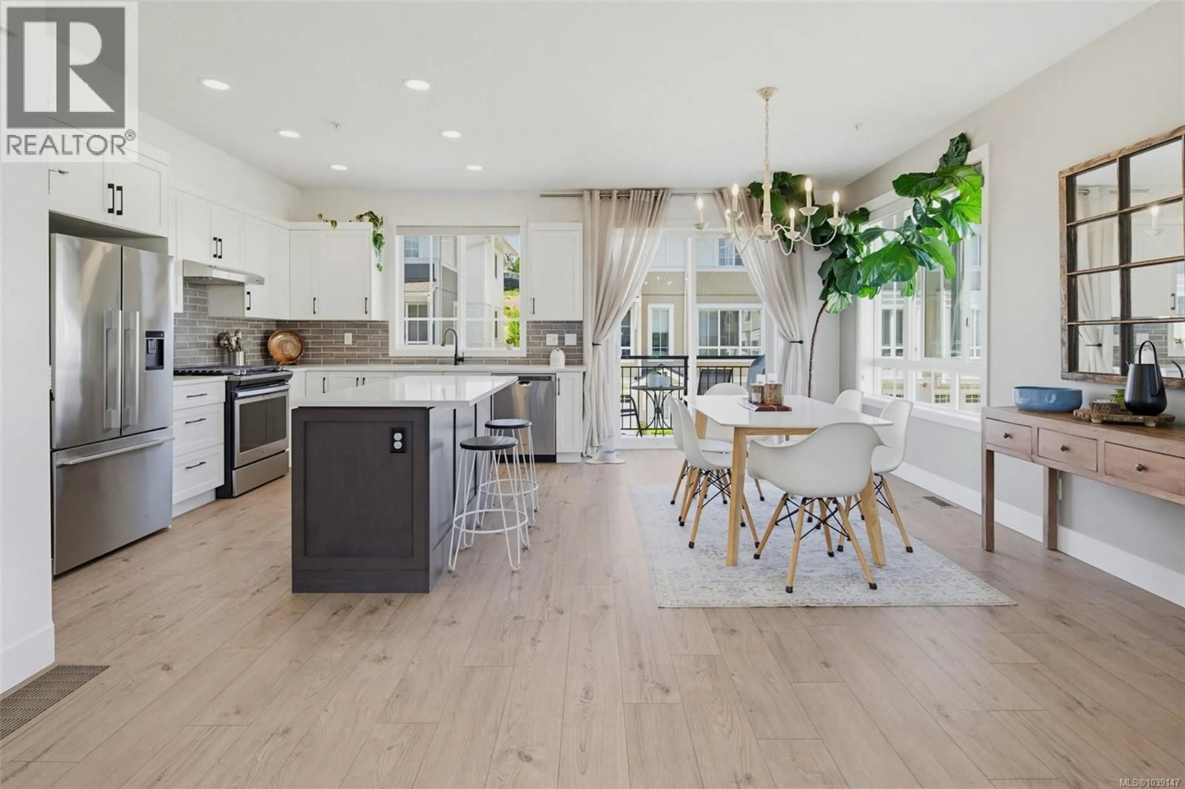 Open concept kitchen, wood/laminate floor for 25 - 370 LATORIA BOULEVARD, Colwood British Columbia V9C0N9