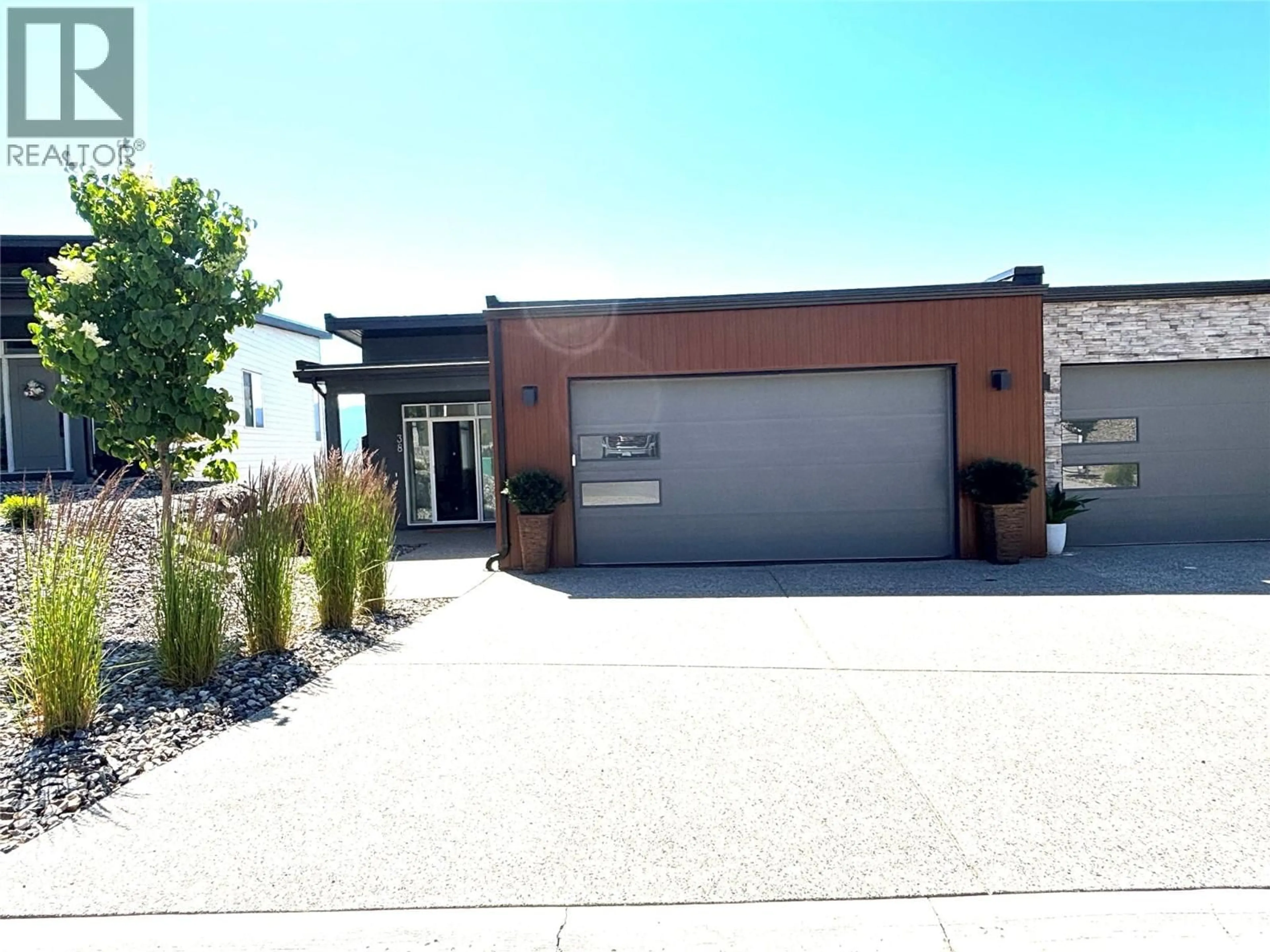 Home with brick exterior material, street for 38 - 7735 OKANAGAN HILLS BOULEVARD, Vernon British Columbia V1H0A7