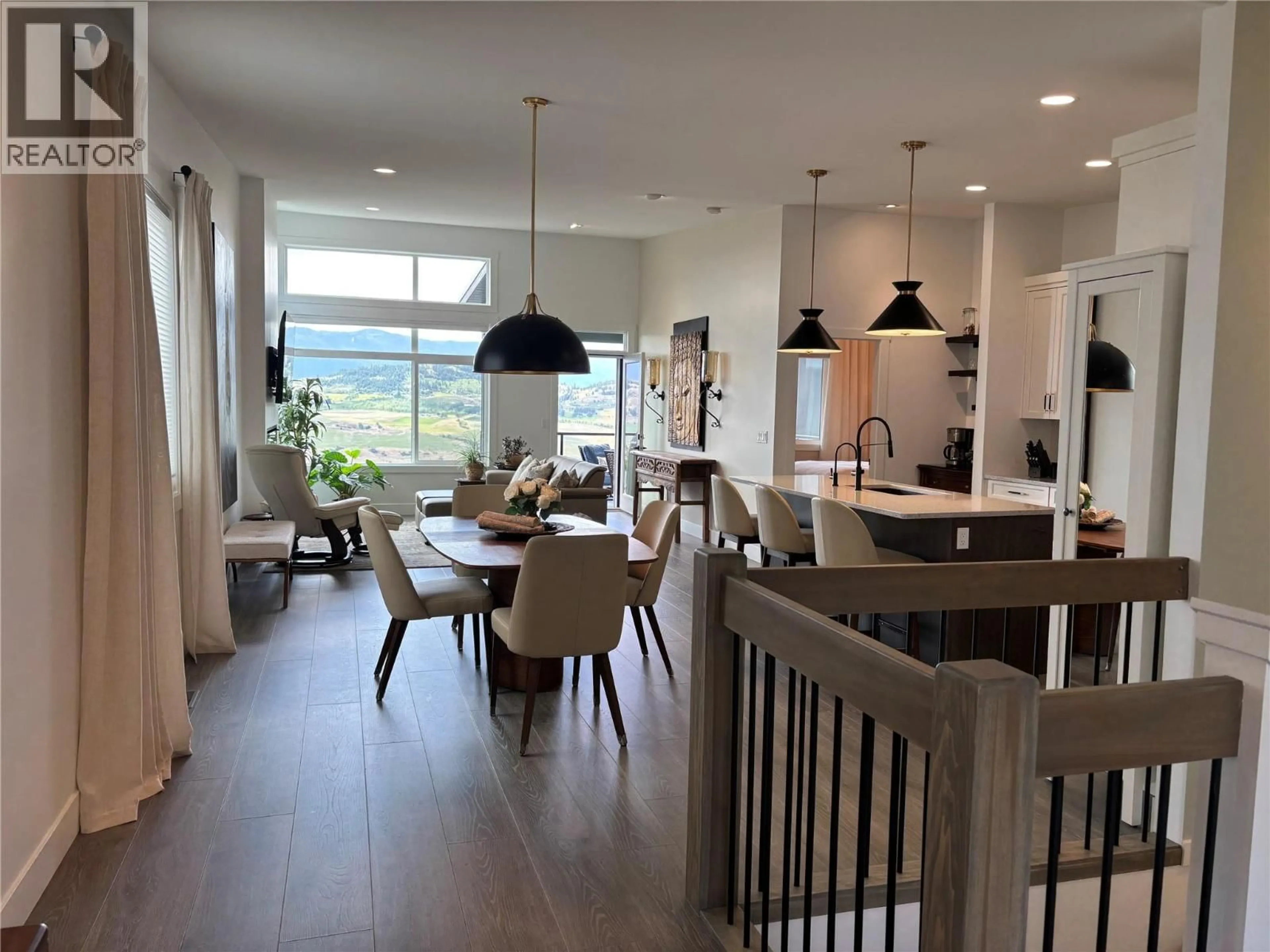 Open concept kitchen, wood/laminate floor for 38 - 7735 OKANAGAN HILLS BOULEVARD, Vernon British Columbia V1H0A7