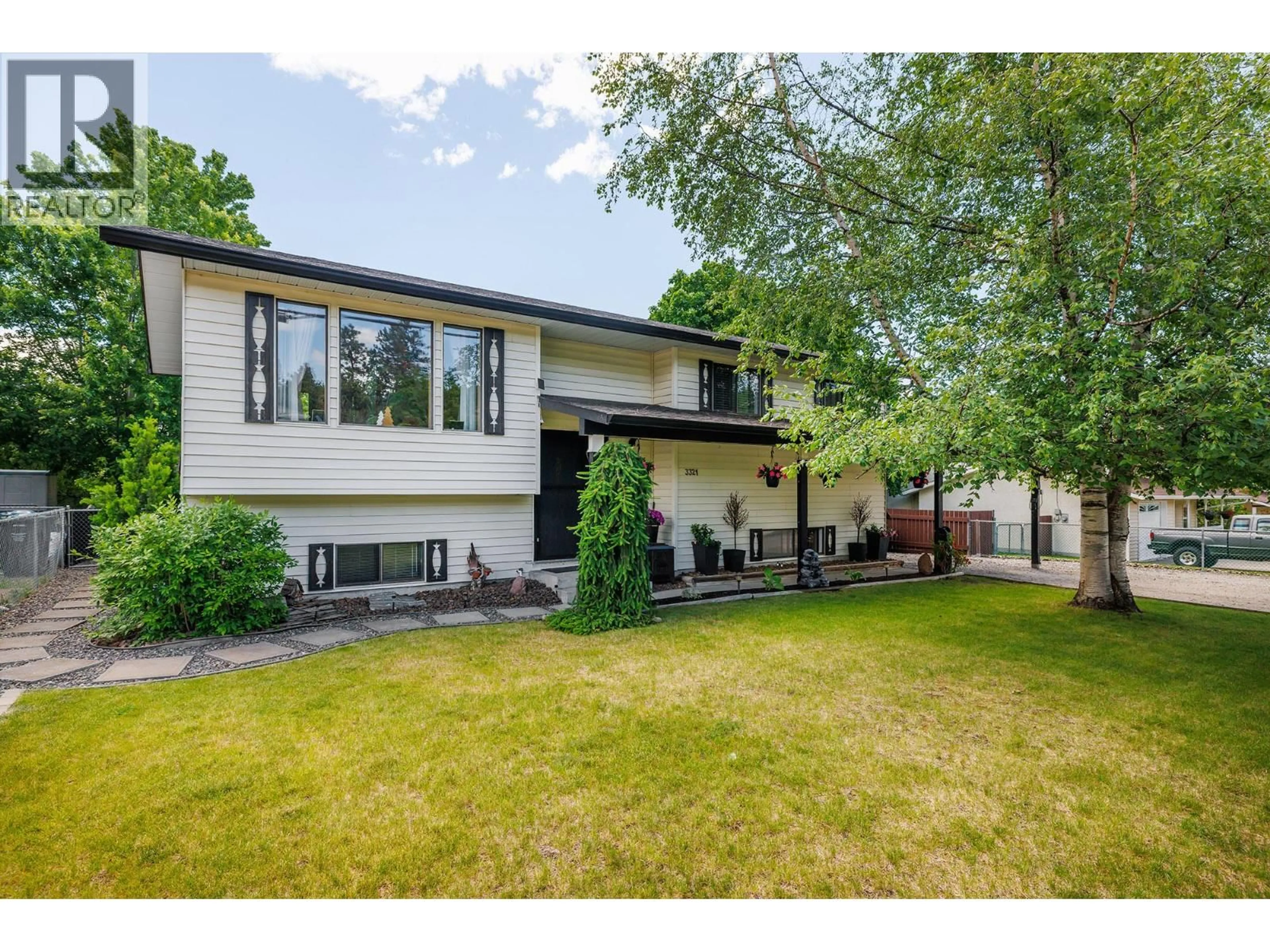 Home with vinyl exterior material, street for 3321 GATES ROAD, West Kelowna British Columbia V4T1B1