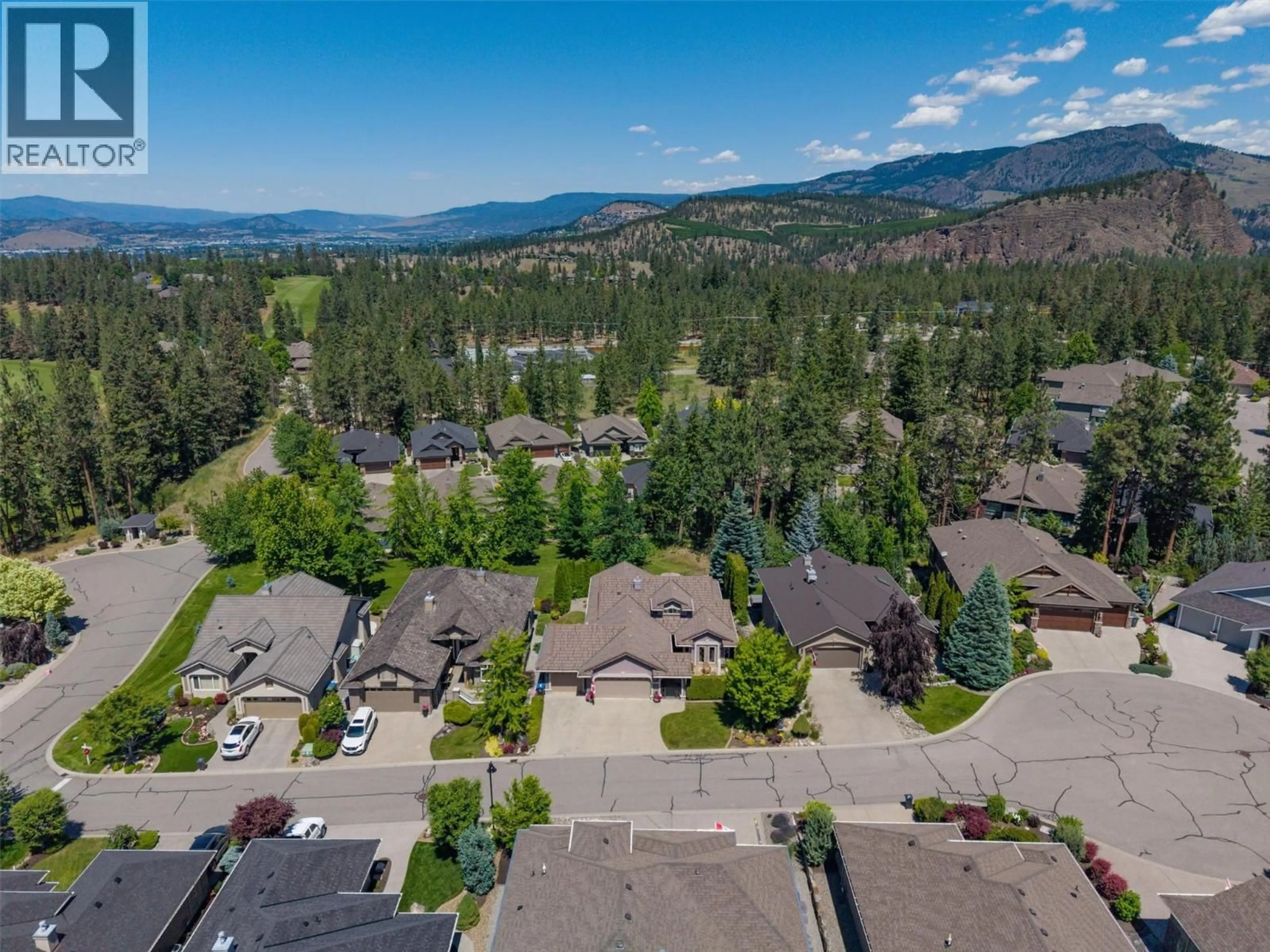 A pic from outside/outdoor area/front of a property/back of a property/a pic from drone, mountain view for 4518 GALLAGHERS EDGEWOOD COURT, Kelowna British Columbia V1W5B6