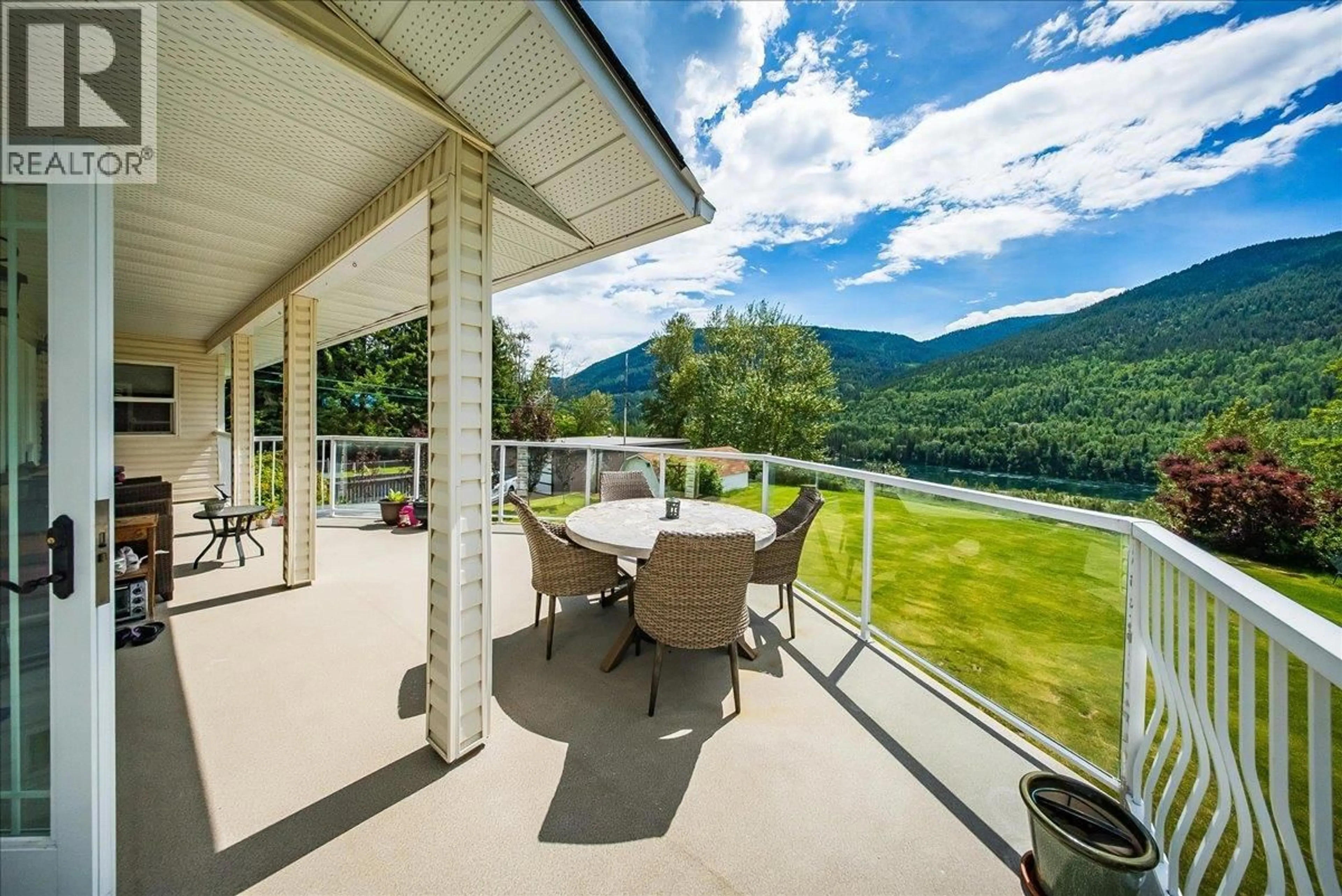 Patio, water/lake/river/ocean view for 412 14TH AVENUE, Genelle British Columbia V0G1G0