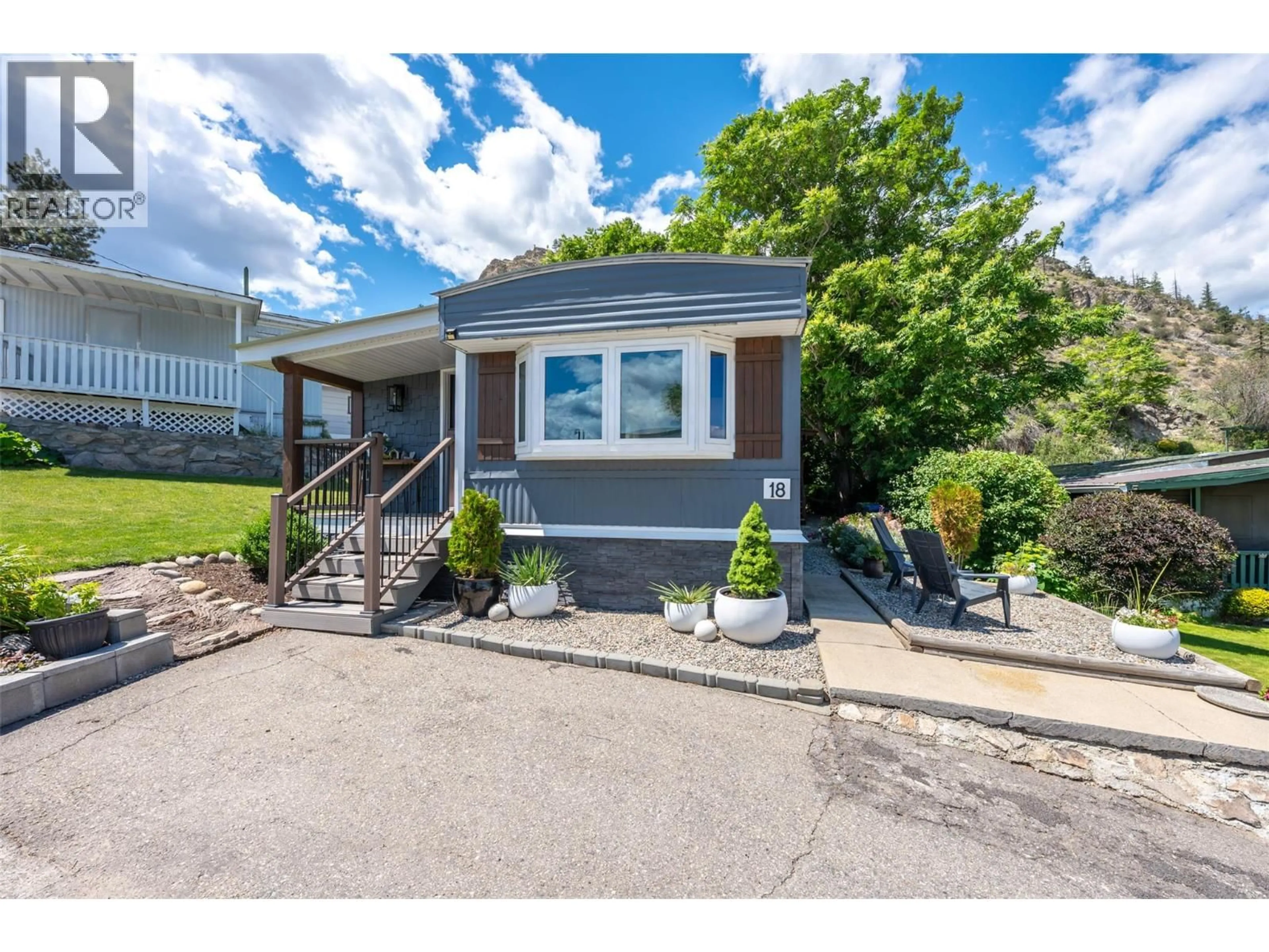 Home with vinyl exterior material, street for 18 - 6822 LEIGHTON CRESCENT, Oliver British Columbia V0H1T2