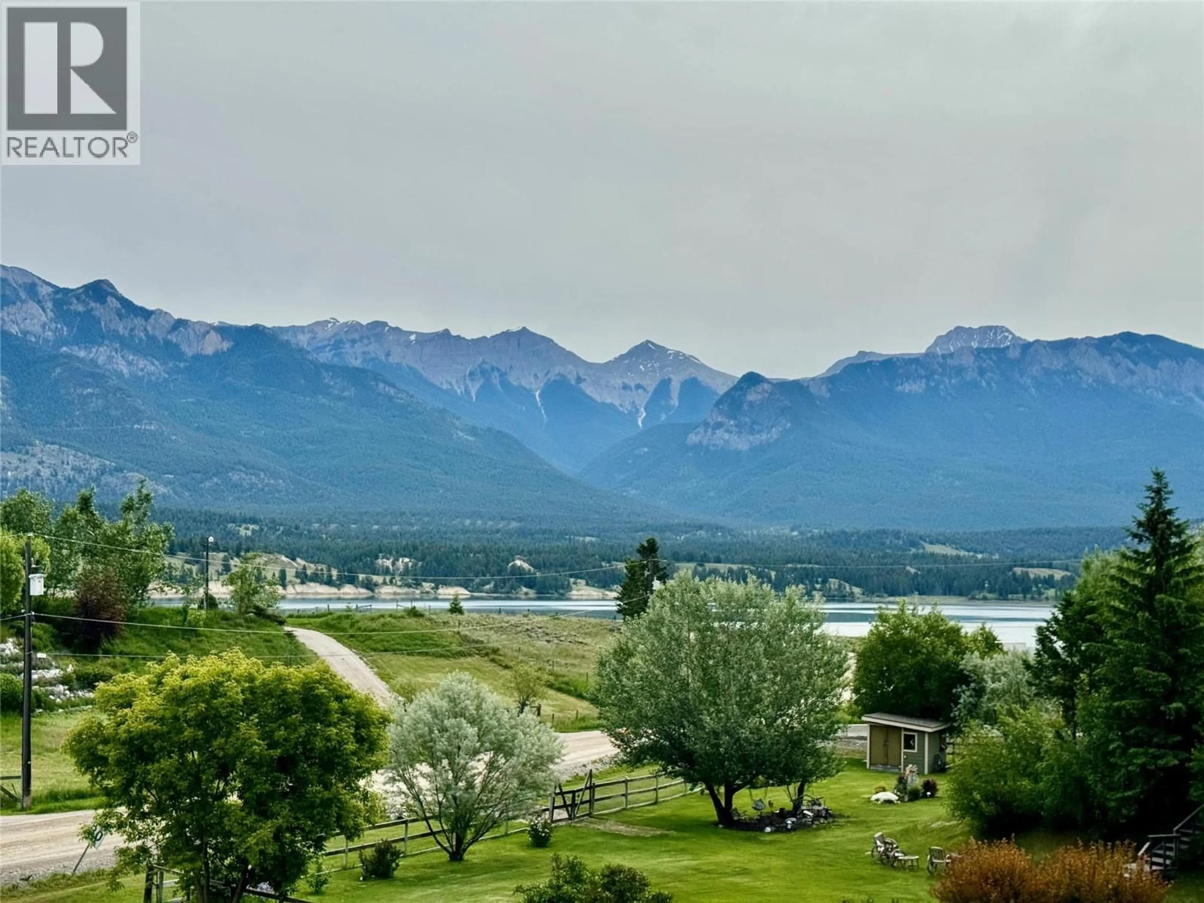 A pic from outside/outdoor area/front of a property/back of a property/a pic from drone, mountain view for 4549 RUSHMERE ROAD, Windermere British Columbia V0A1K4