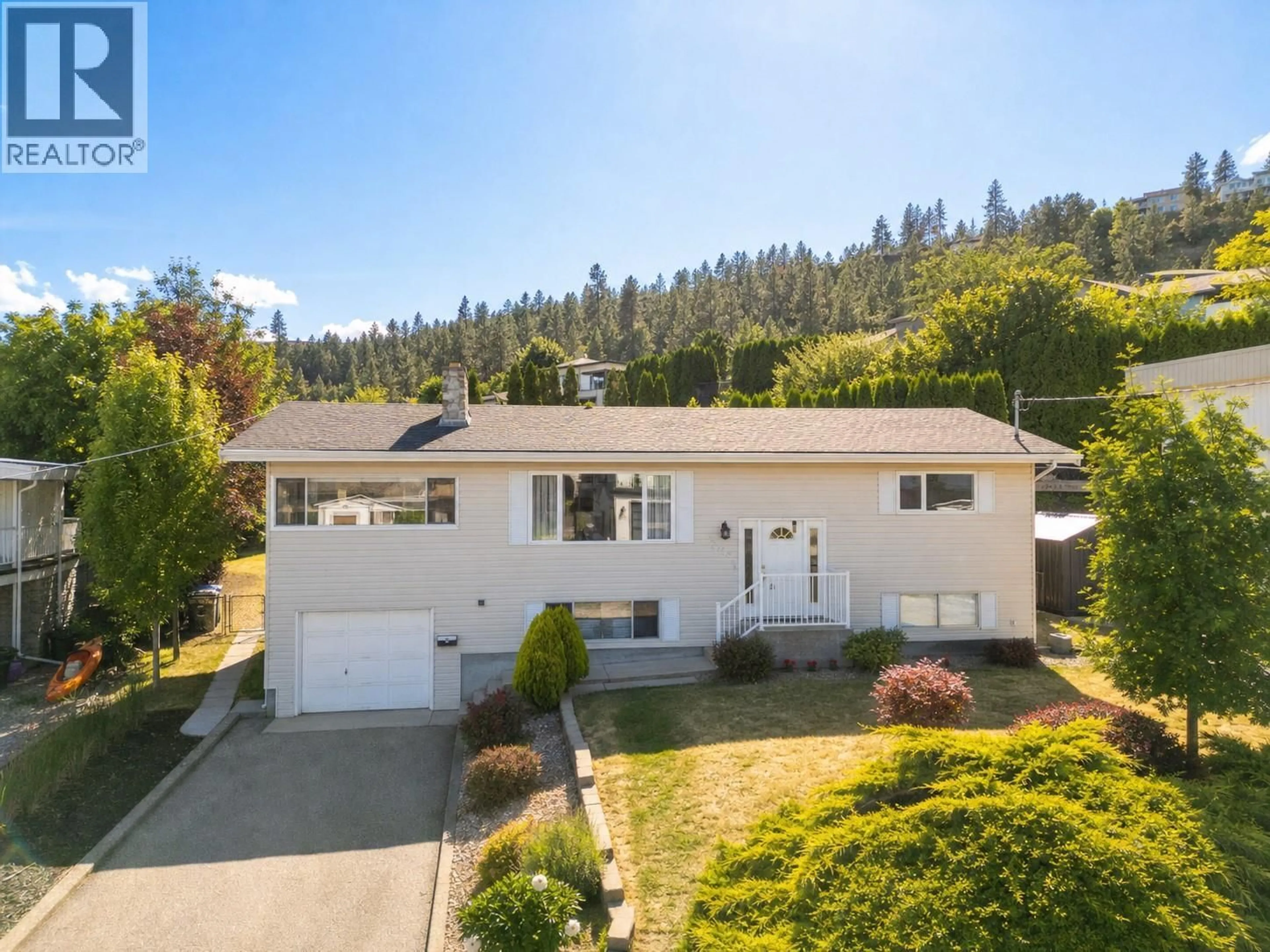 A pic from outside/outdoor area/front of a property/back of a property/a pic from drone, street for 2612 CASA LOMA ROAD, West Kelowna British Columbia V1Z1T5